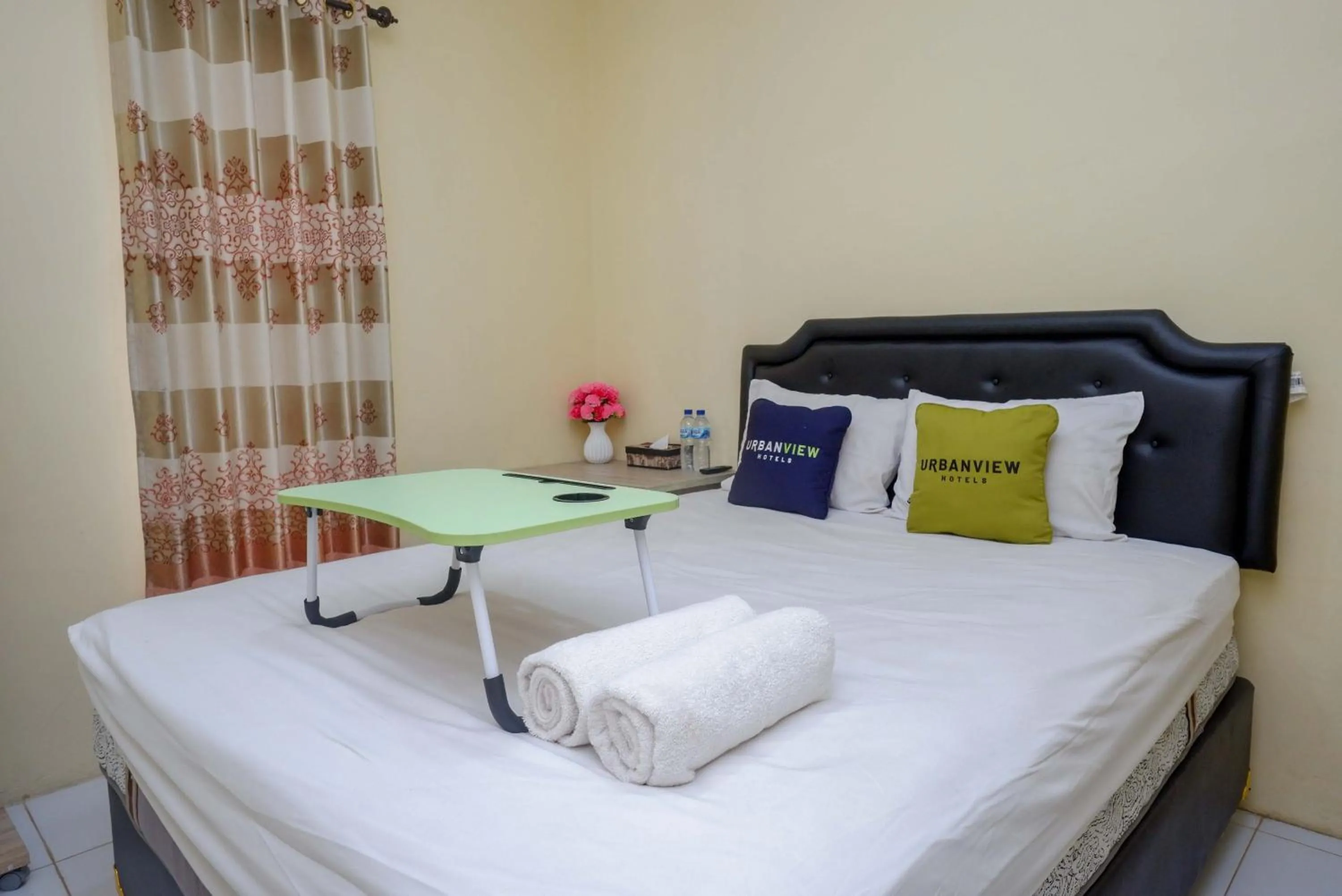 Bedroom, Bed in Urbanview Hotel Jogja City Mall