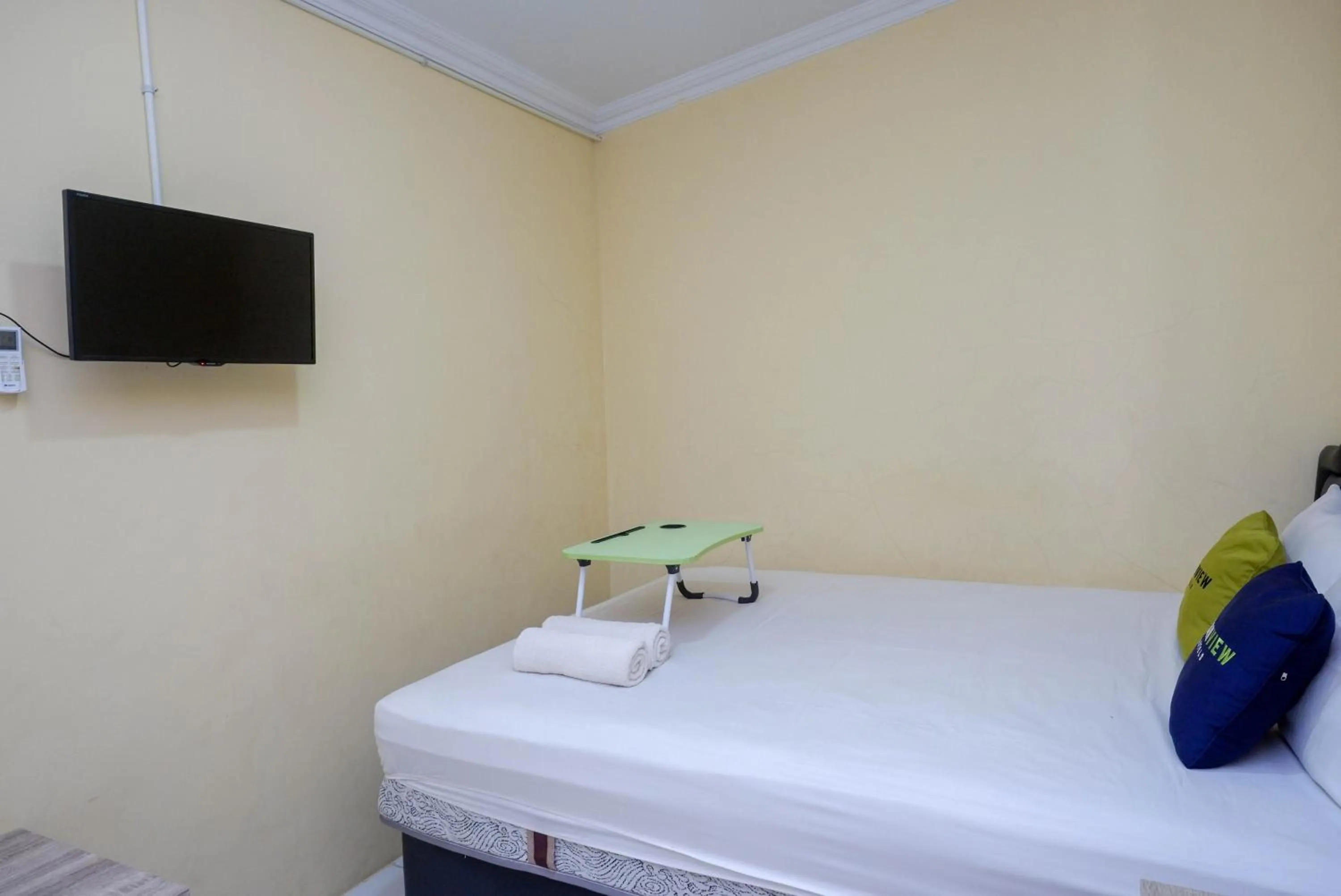 Bedroom, Bed in Urbanview Hotel Jogja City Mall