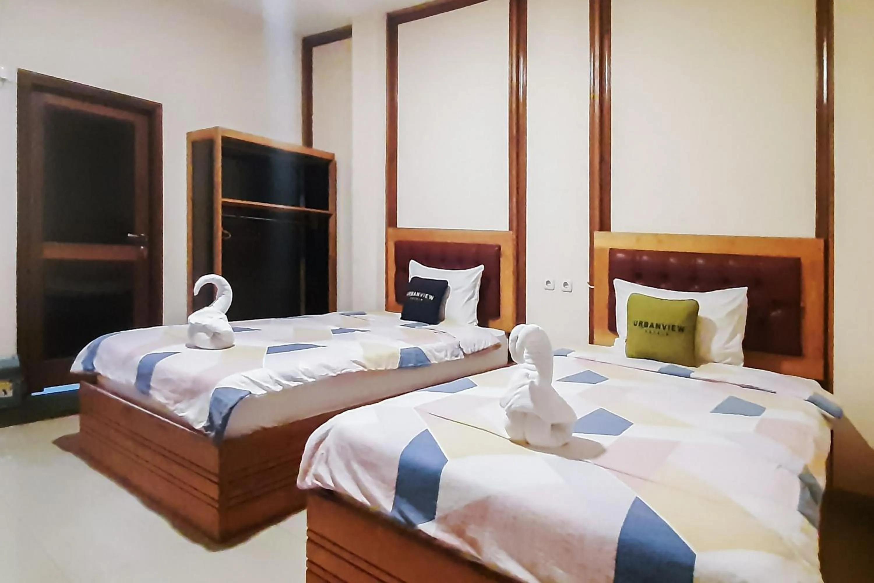 Bedroom, Bed in Urbanview Remington Hotel Palembang By RedDoorz