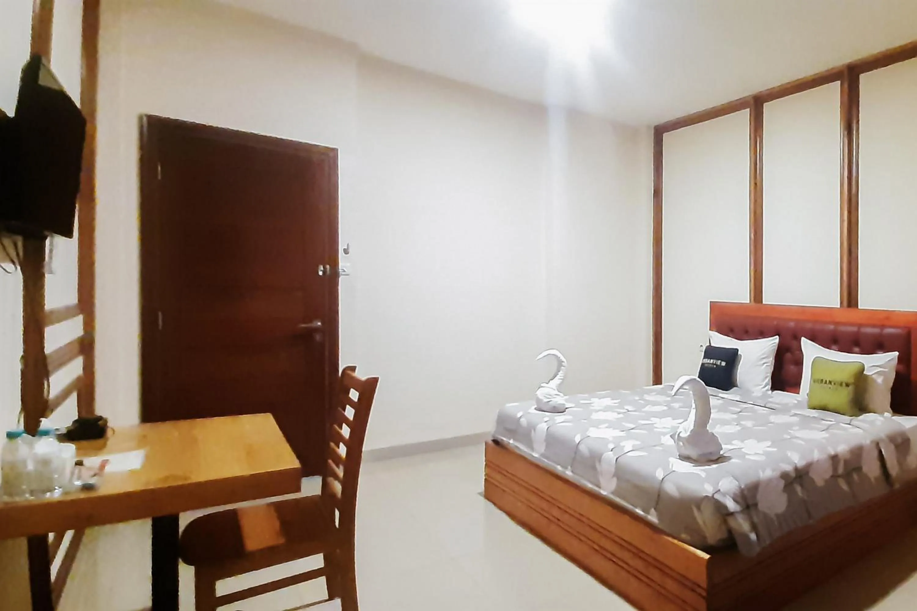 Bedroom, Bed in Urbanview Remington Hotel Palembang By RedDoorz