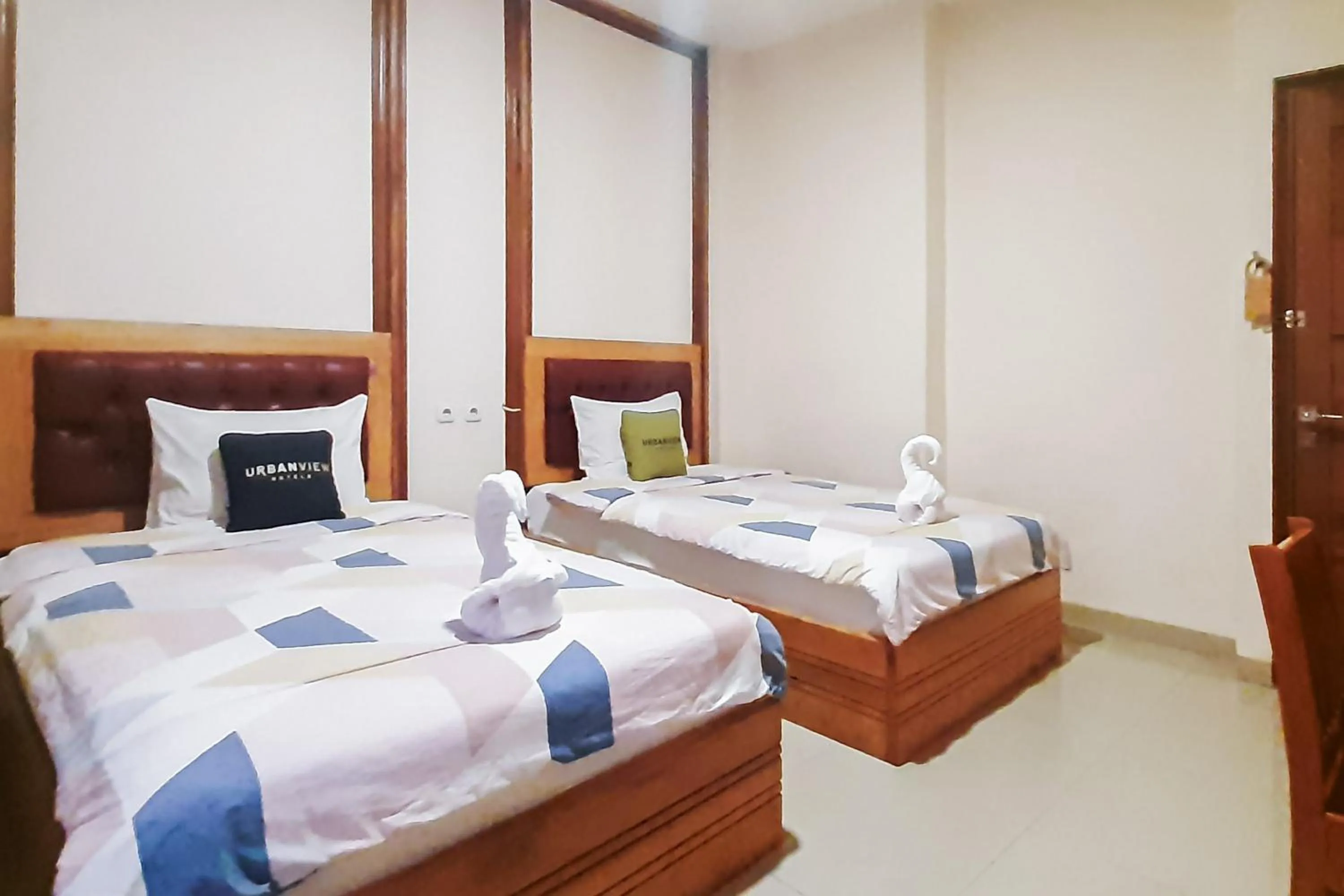 Bedroom, Bed in Urbanview Remington Hotel Palembang By RedDoorz