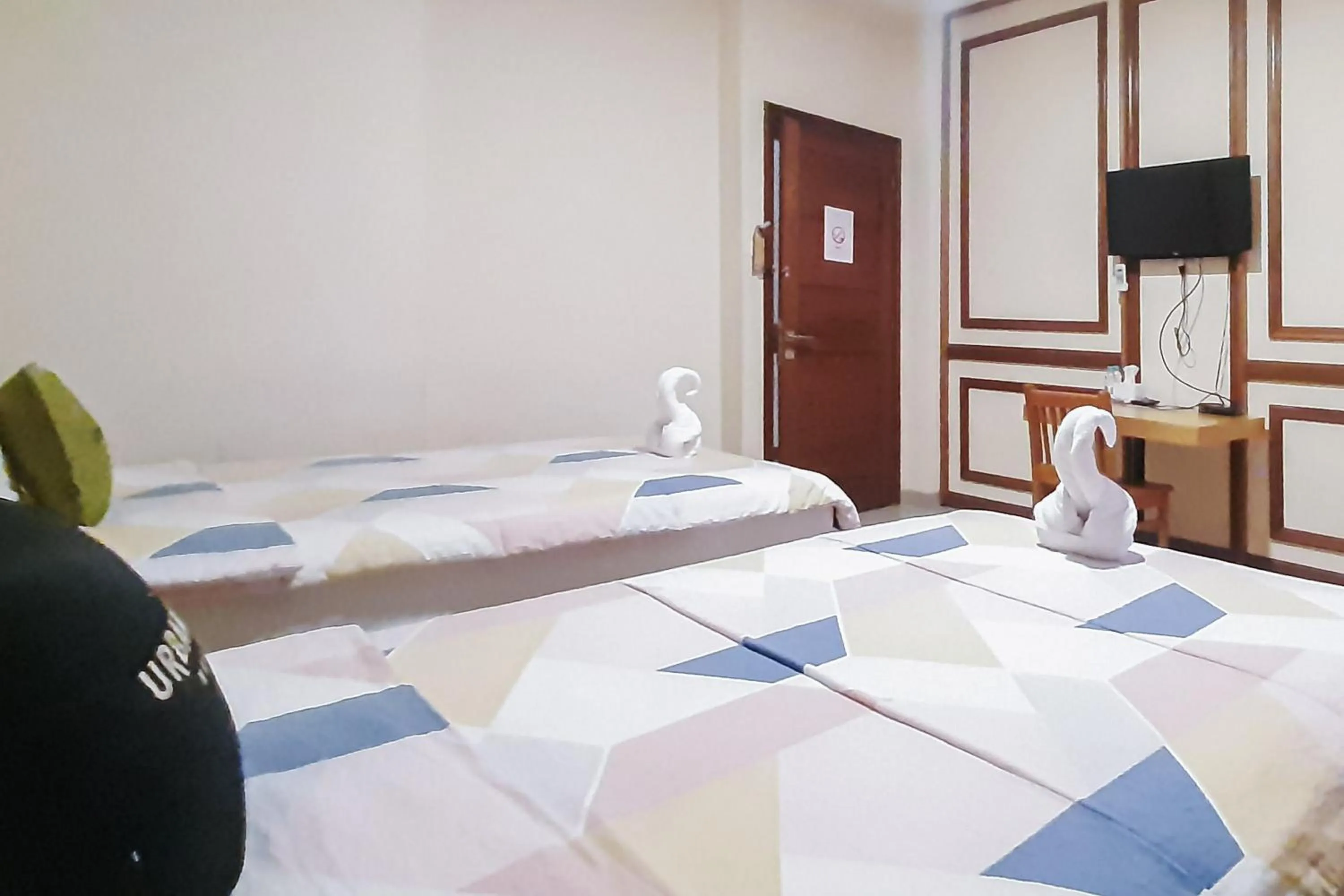 Bedroom, Bed in Urbanview Remington Hotel Palembang By RedDoorz