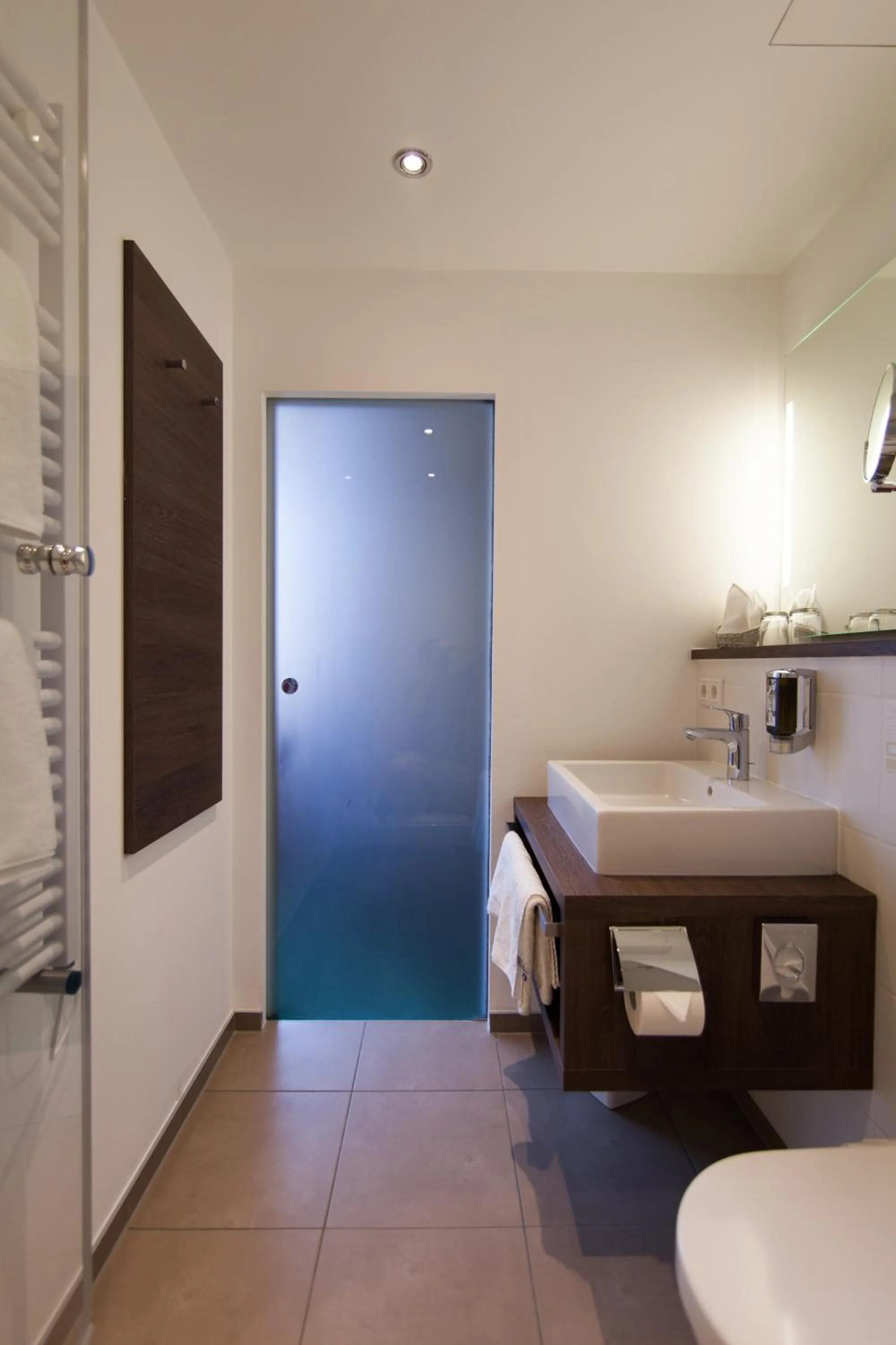 Bathroom, Bed in Hotel Grünwald