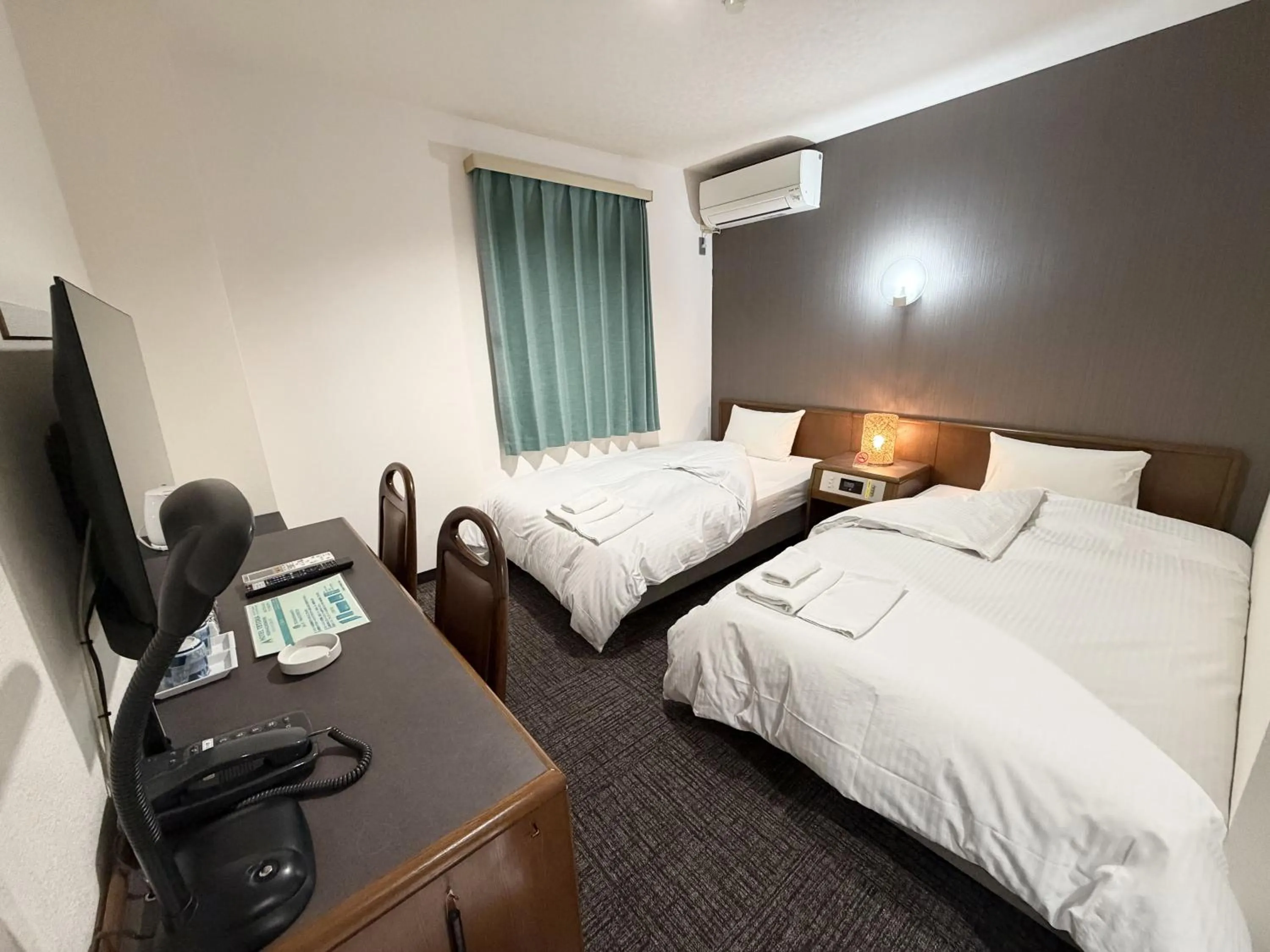 Bed in Hotel Tetora HonHachinohe