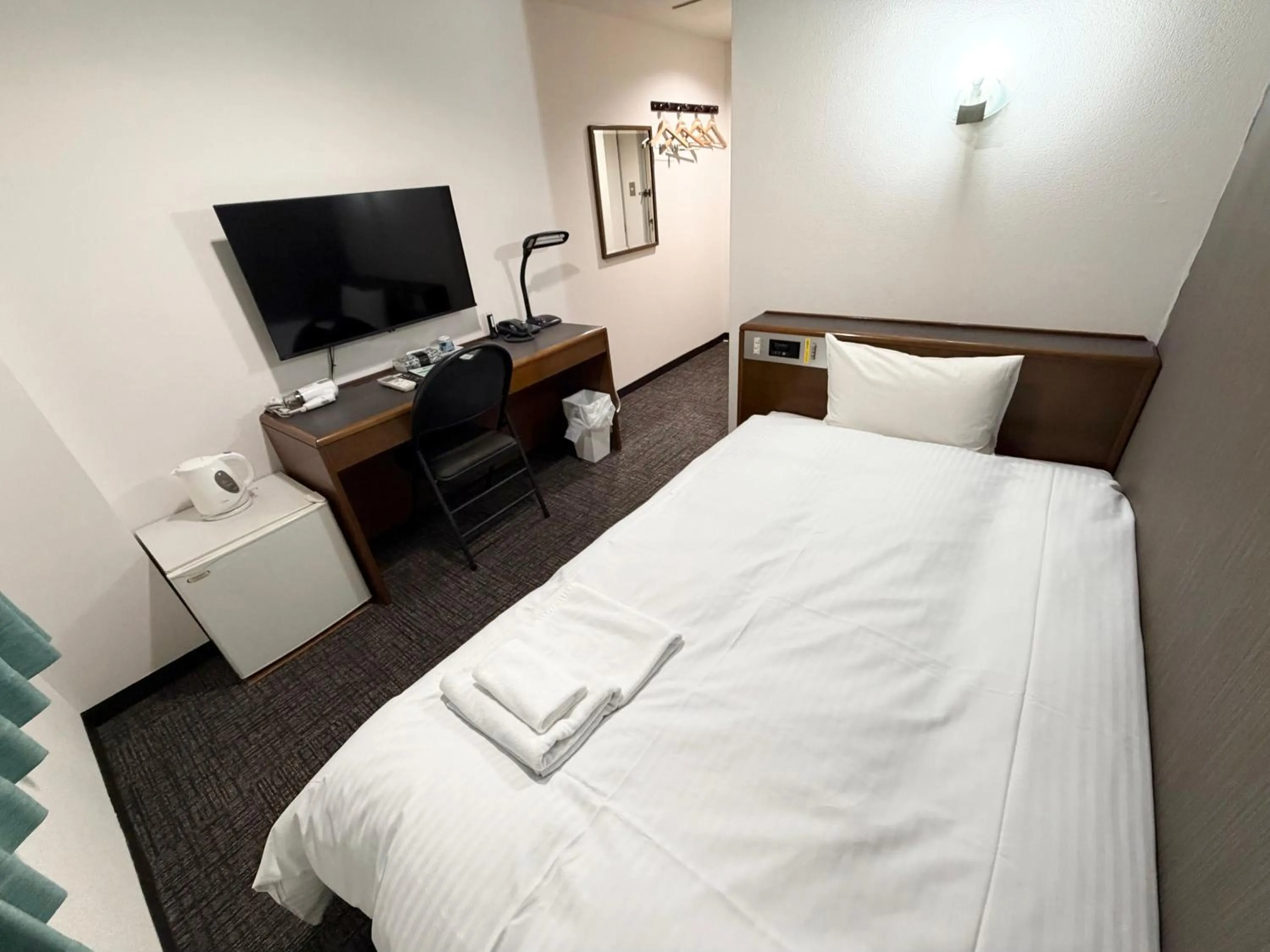 Bed in Hotel Tetora HonHachinohe