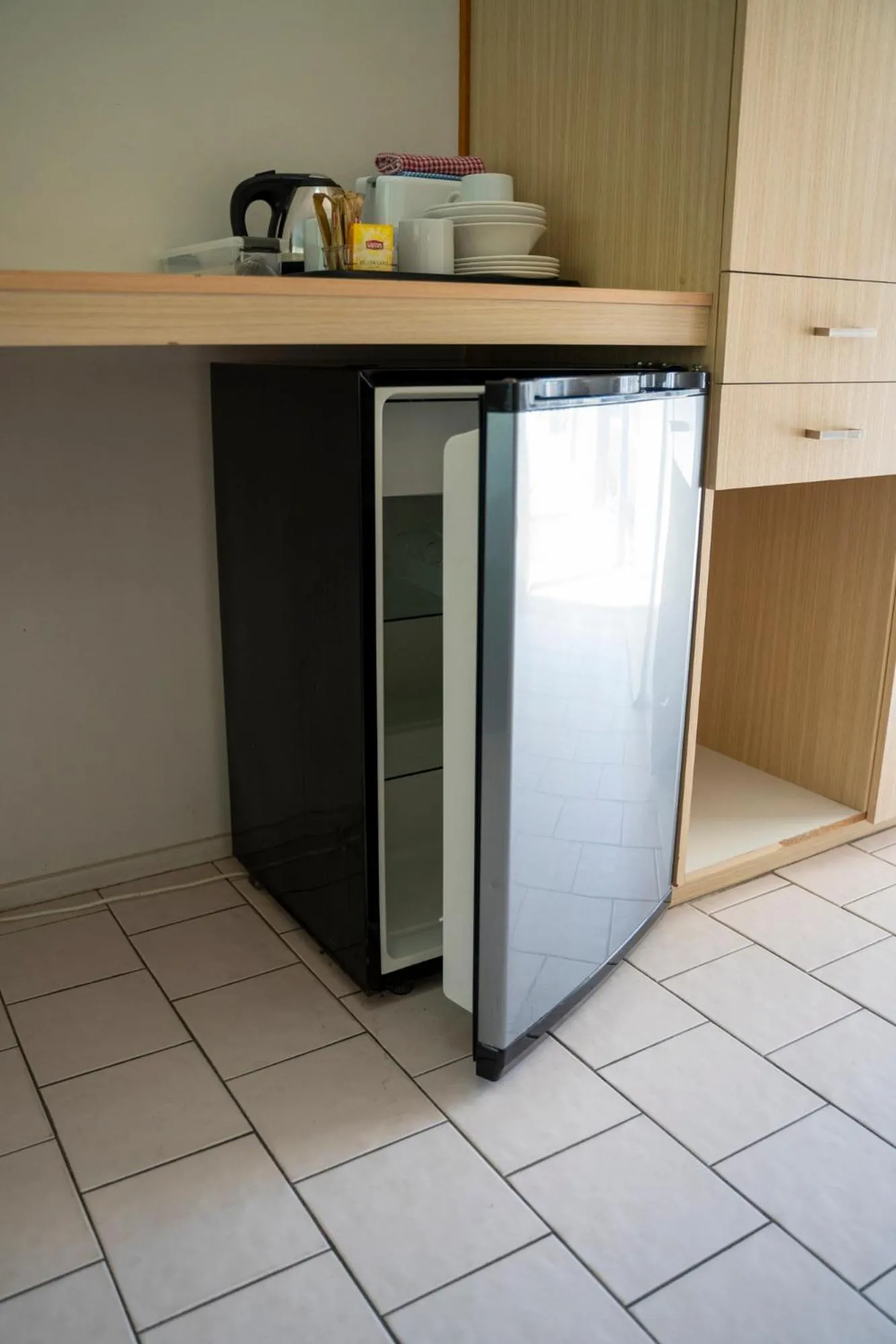 Kitchen or kitchenette in Woolgoolga Coast Motel