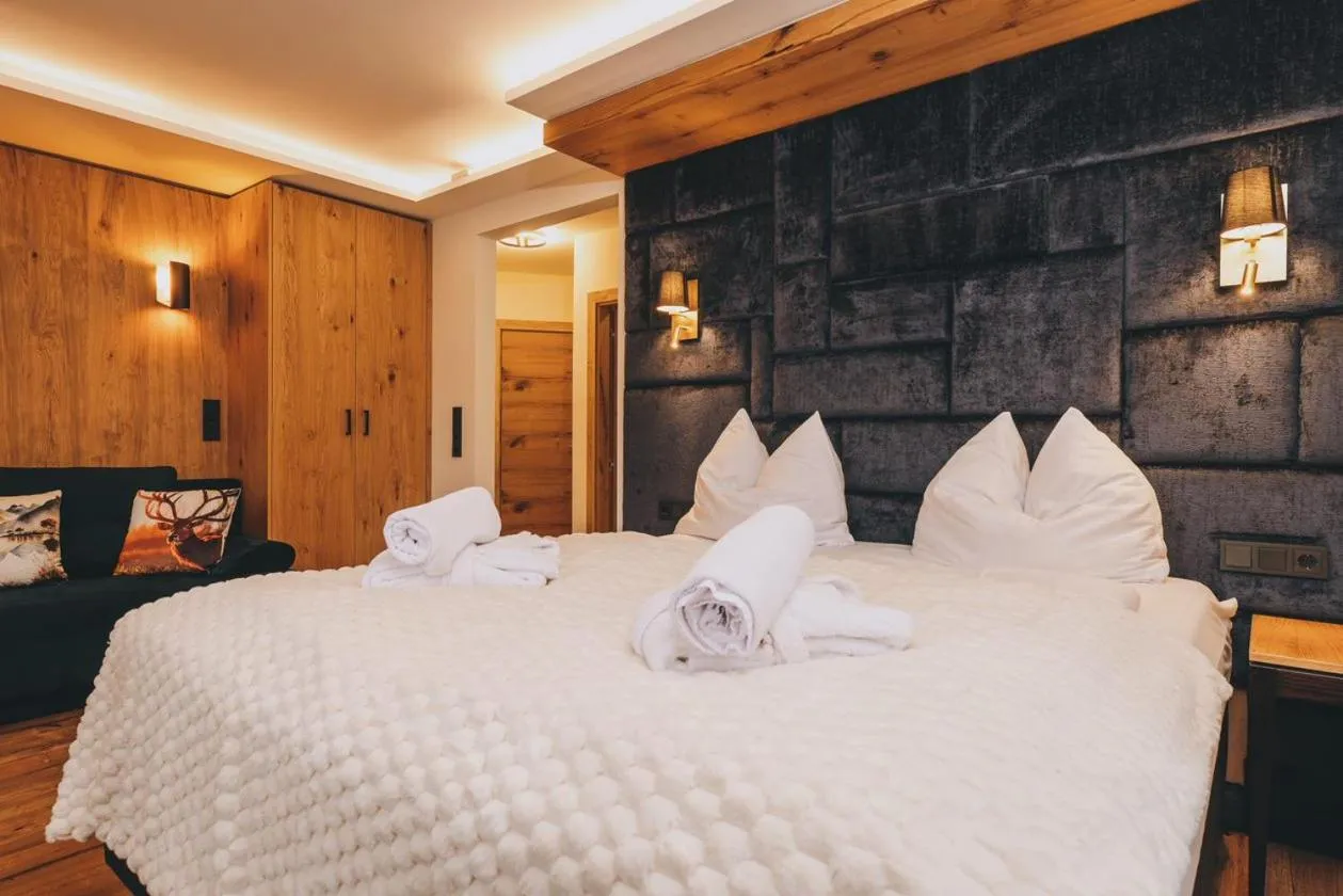 Bed in Hotel Gasthof Mitteregger - BEST PLACE in town with summercard included