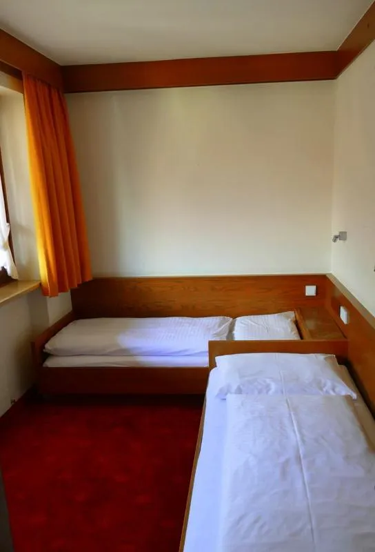 Photo of the whole room, Bed in Hotel Gasthof Mitteregger - BEST PLACE in town with summercard included