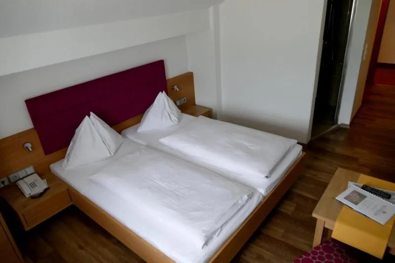 Bed in Hotel Gasthof Mitteregger - BEST PLACE in town with summercard included