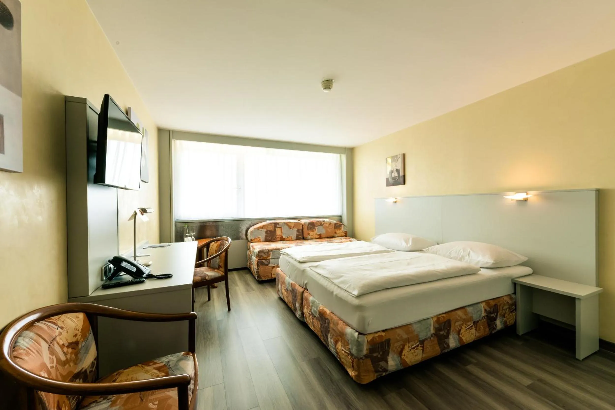 Photo of the whole room, Bed in City Hotel Heilbronn