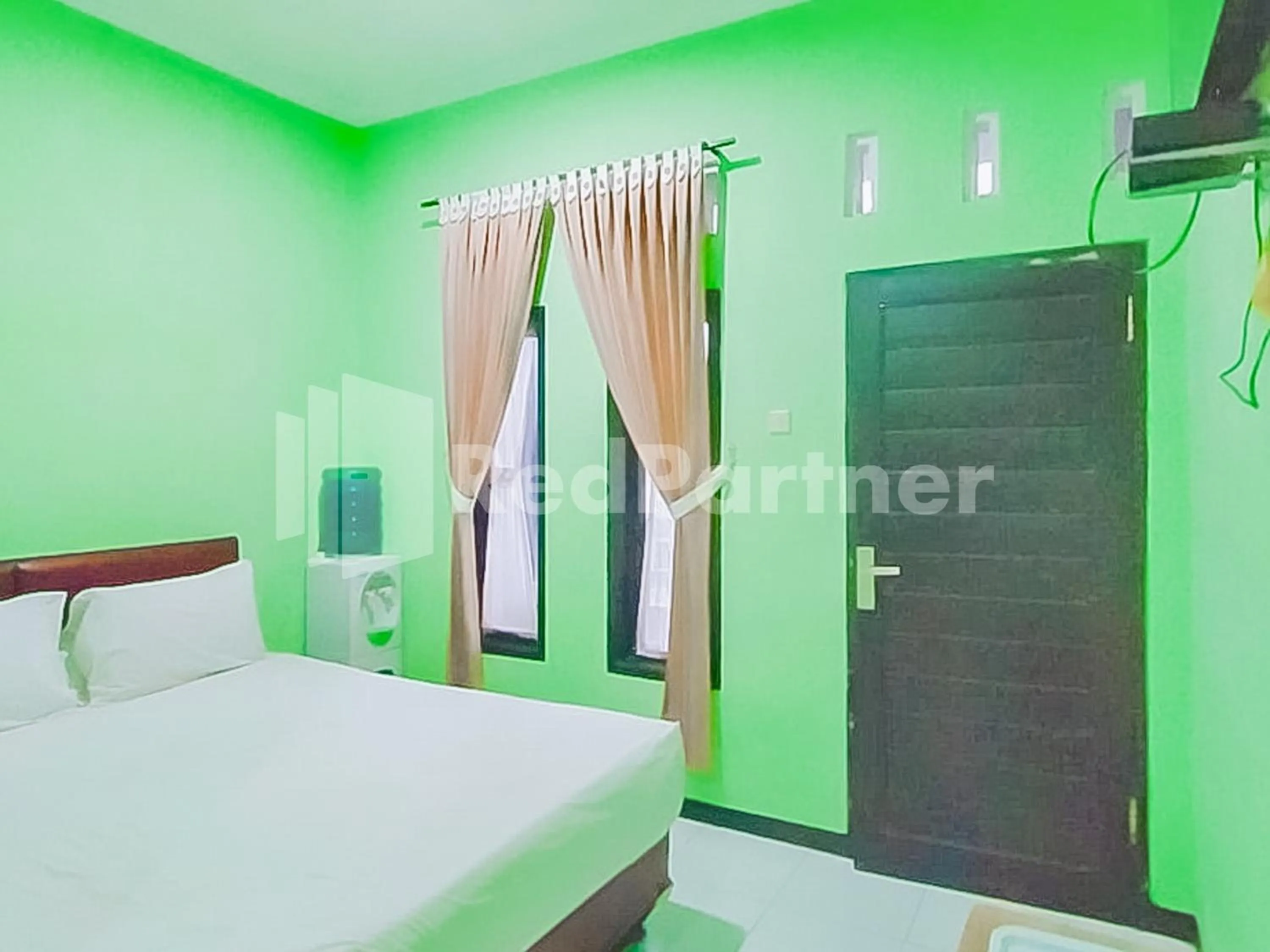 Bedroom, Bed in Indah Savana Hotel Mitra RedDoorz