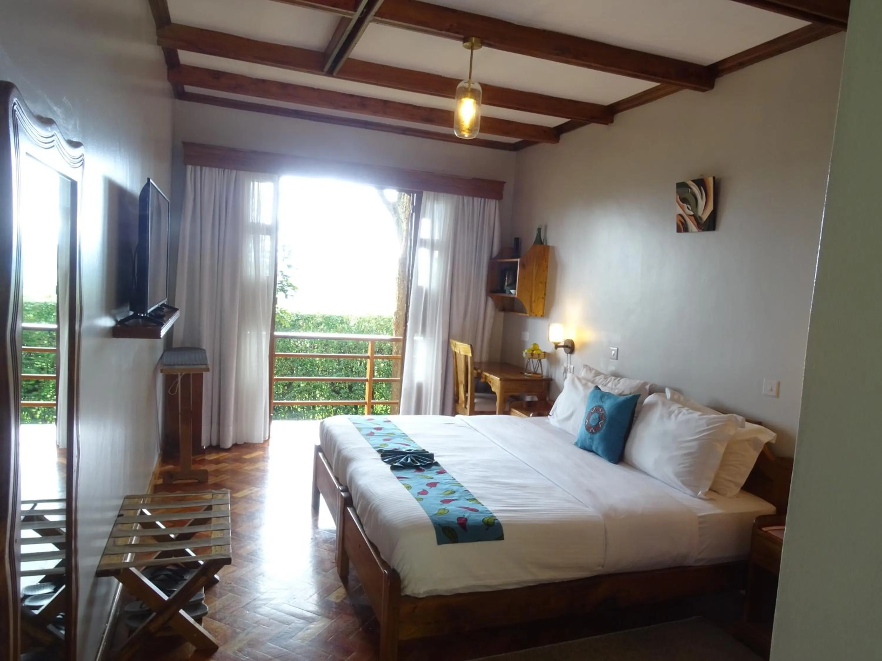 Bed in Le Pristine Wellness and Healing Hotel