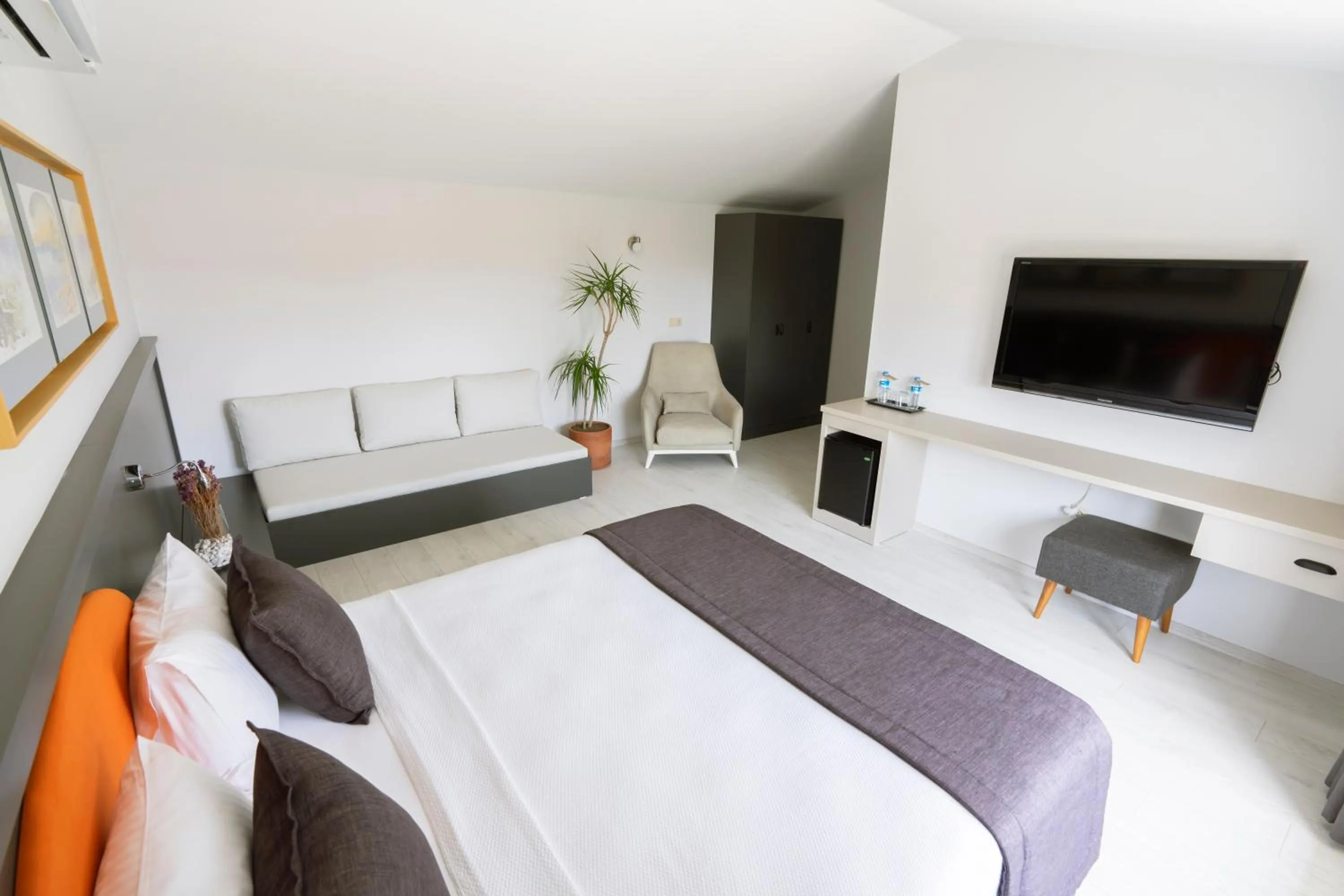 Bed in WEST HOUSE EXCLUSIVE HOTEL