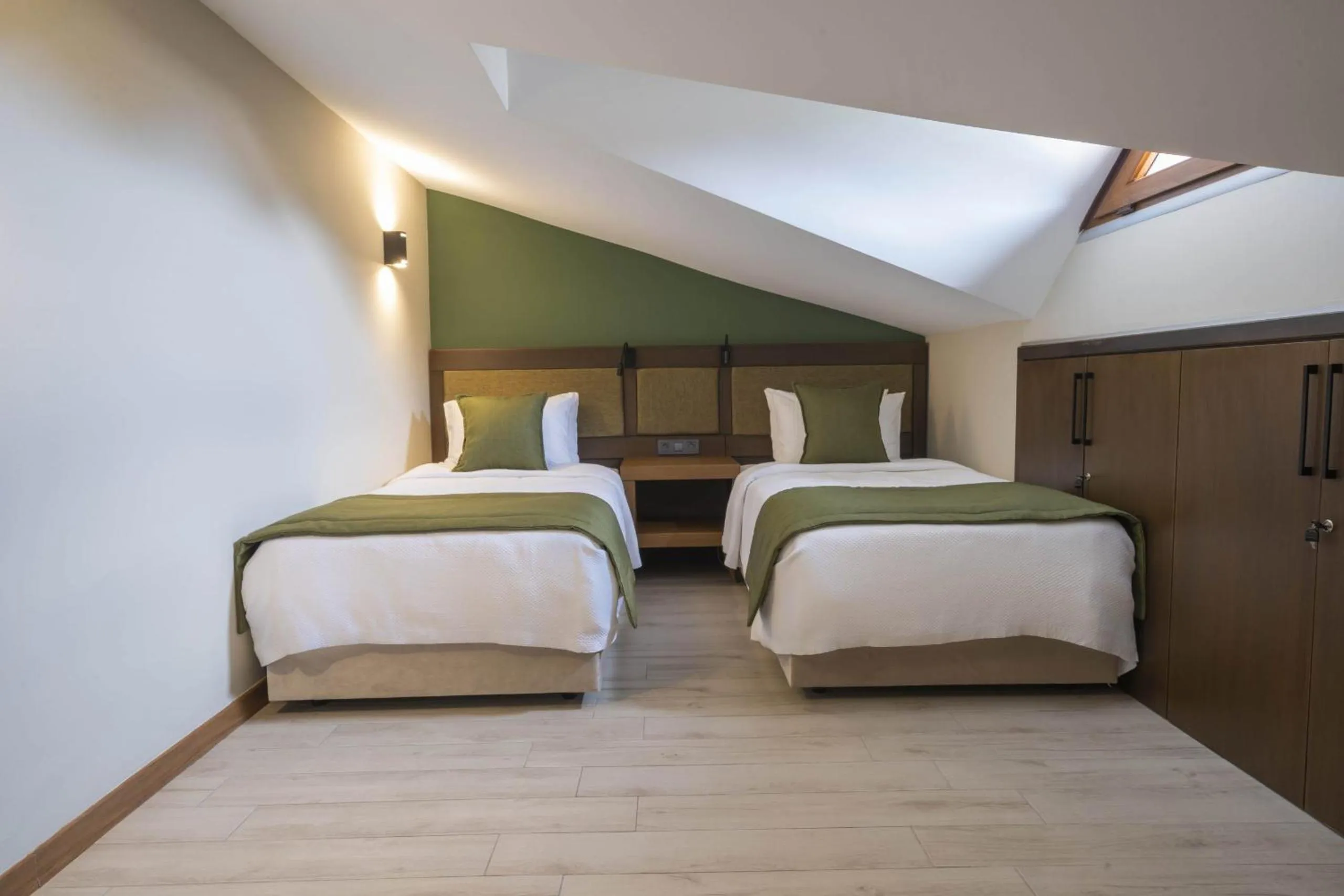 Bed in WEST HOUSE EXCLUSIVE HOTEL