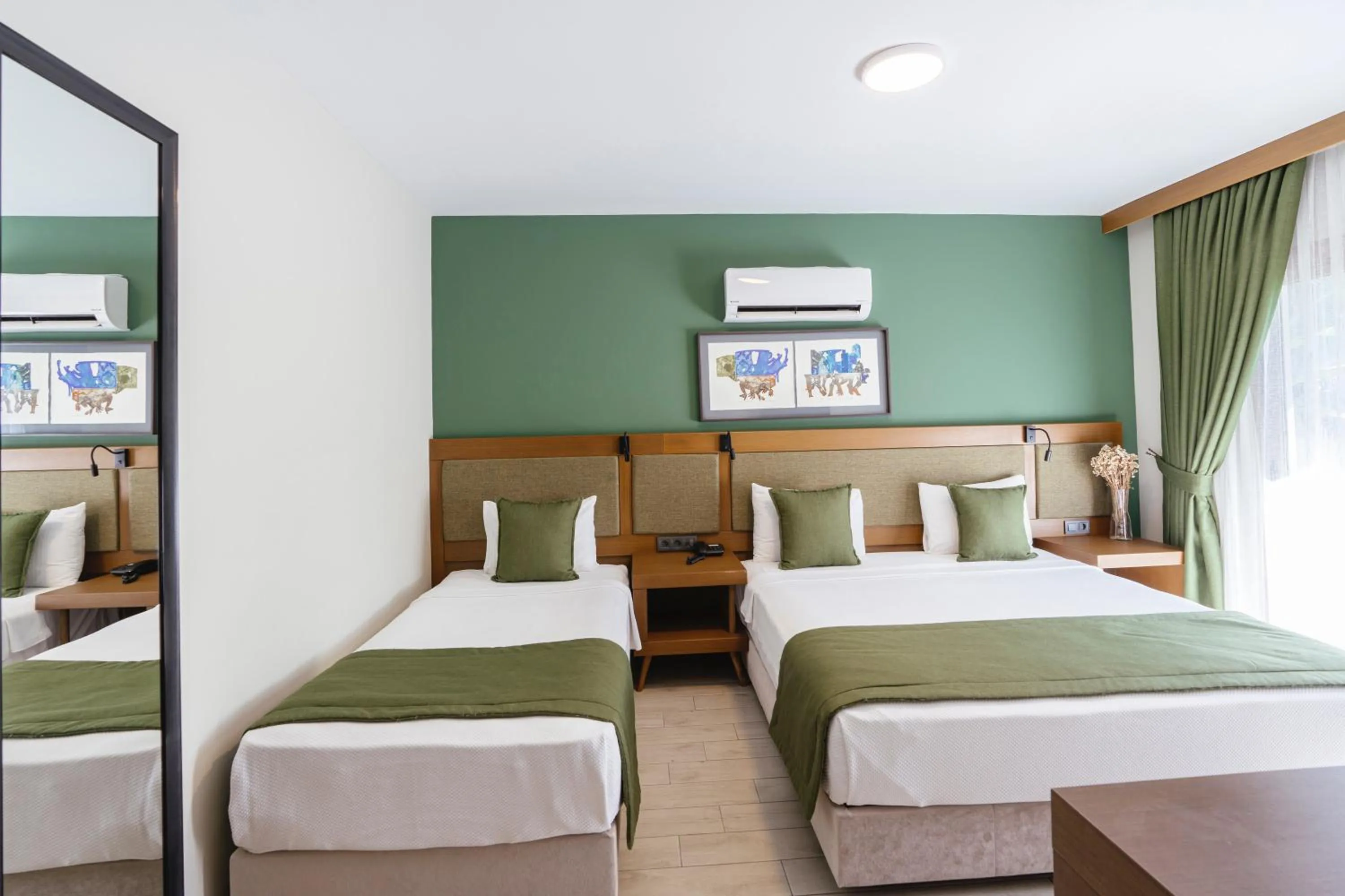 Bed in WEST HOUSE EXCLUSIVE HOTEL