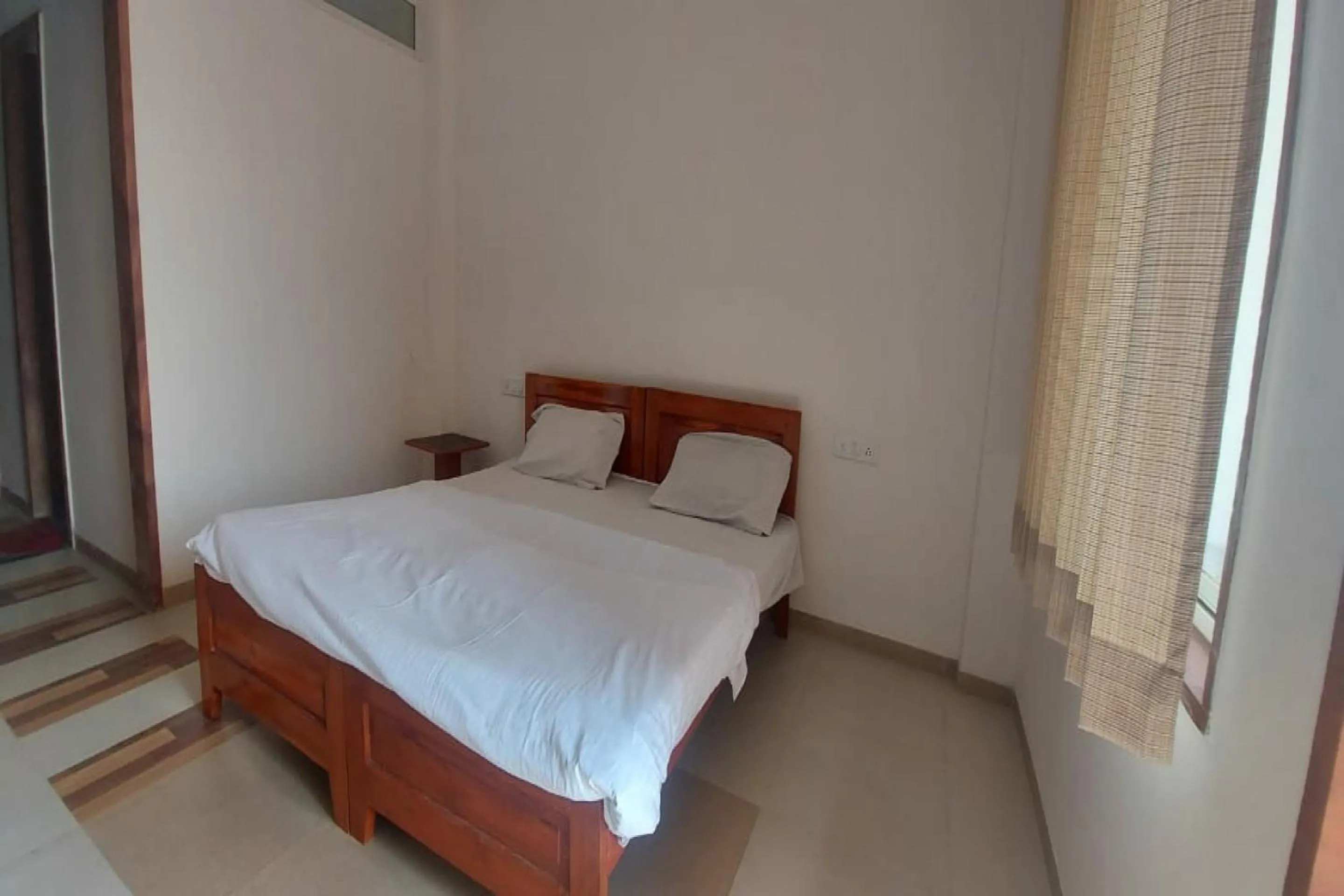 Bedroom in SPOT ON by OYO Shyam Dharamshala