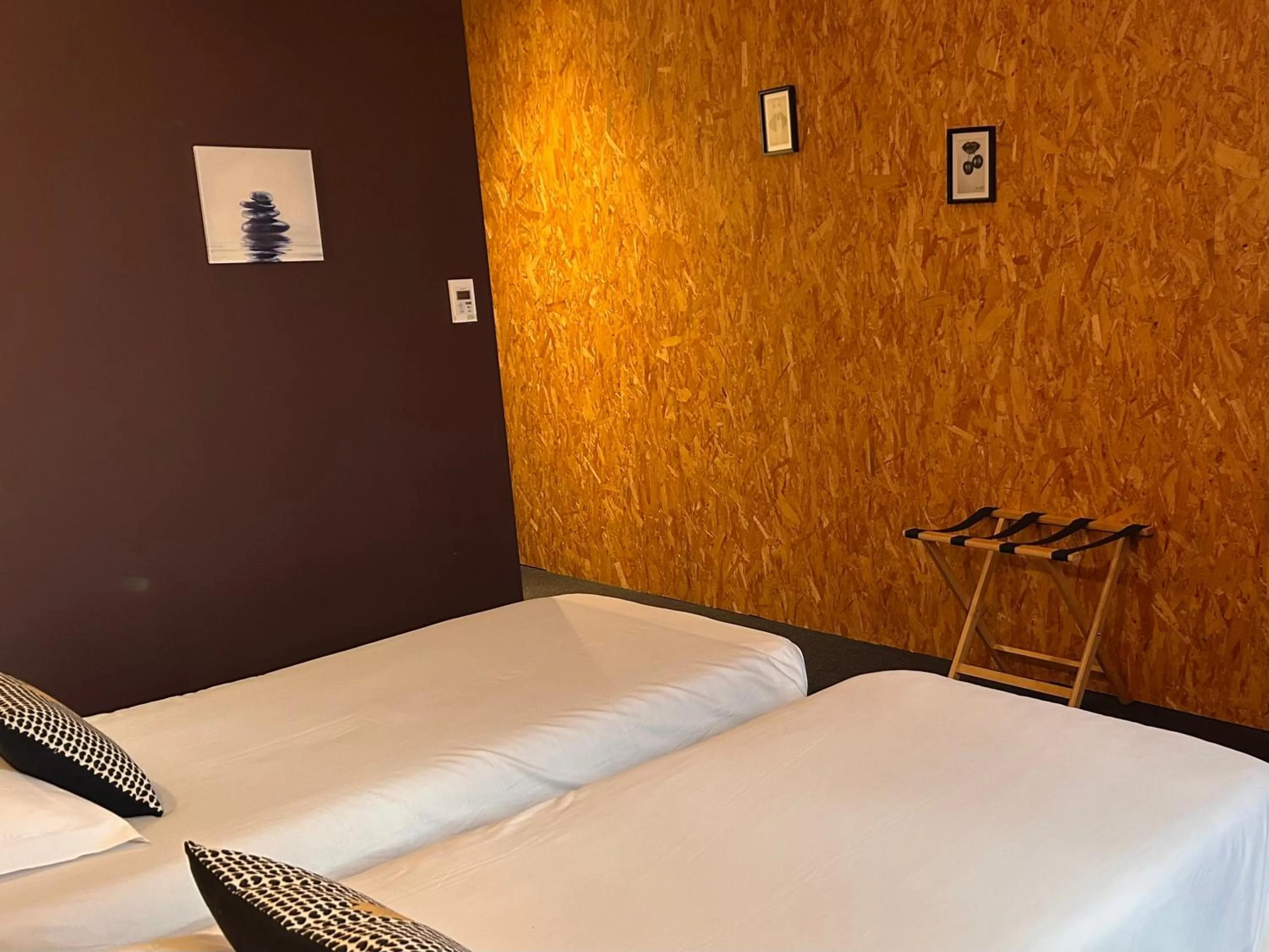 Bed in Fasthotel L'Eldorado