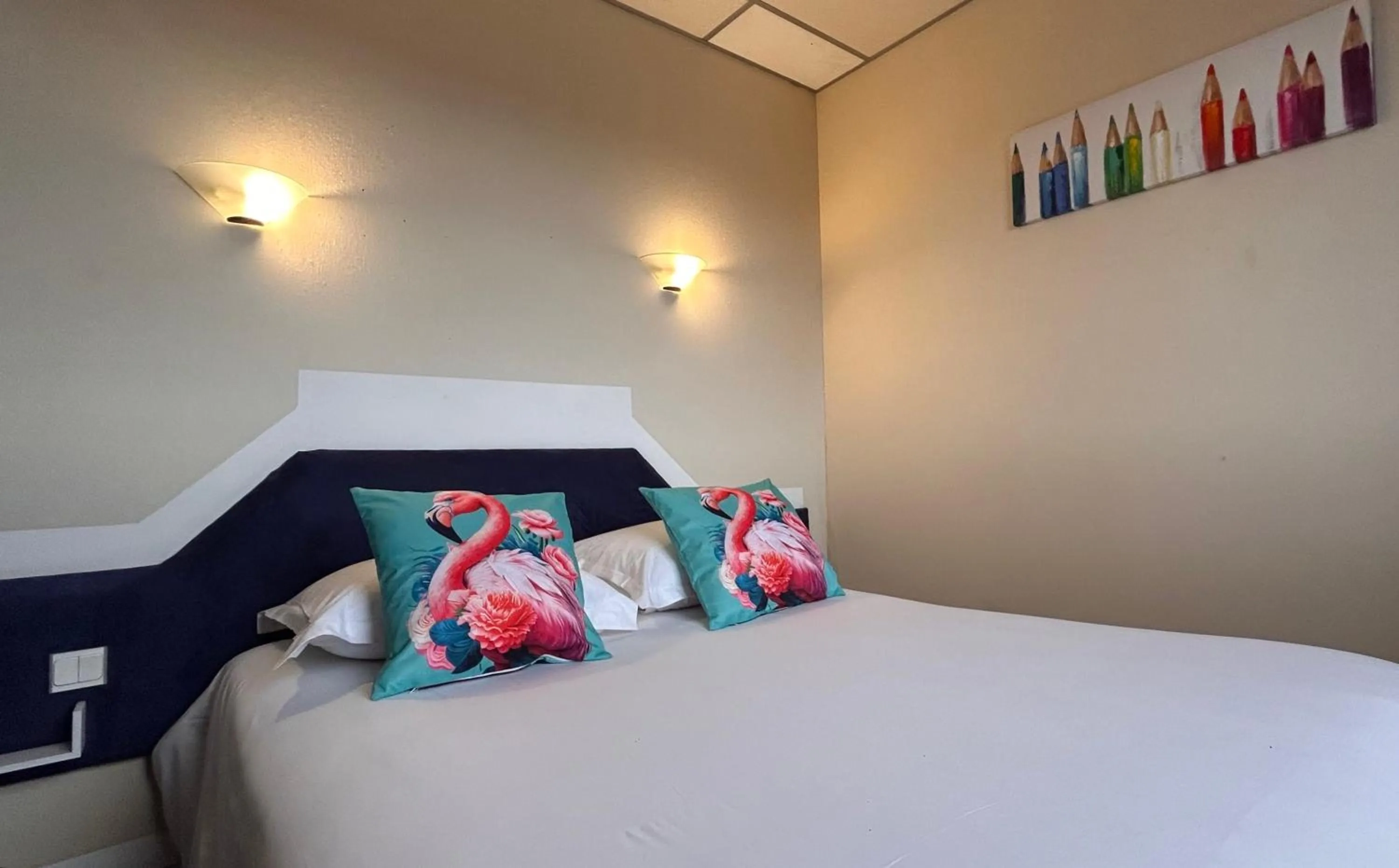 Bed in Fasthotel L'Eldorado