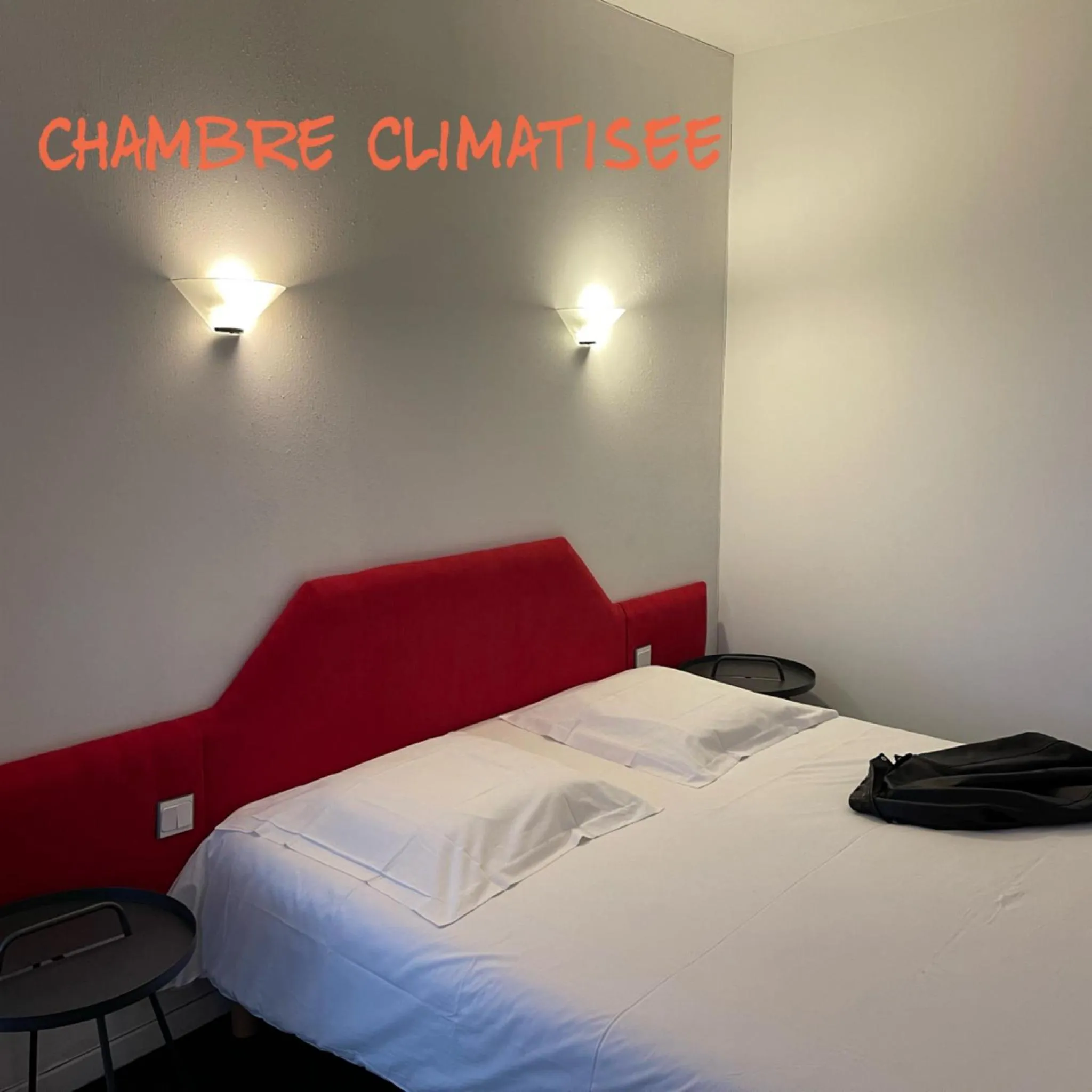 Bed in Fasthotel L'Eldorado