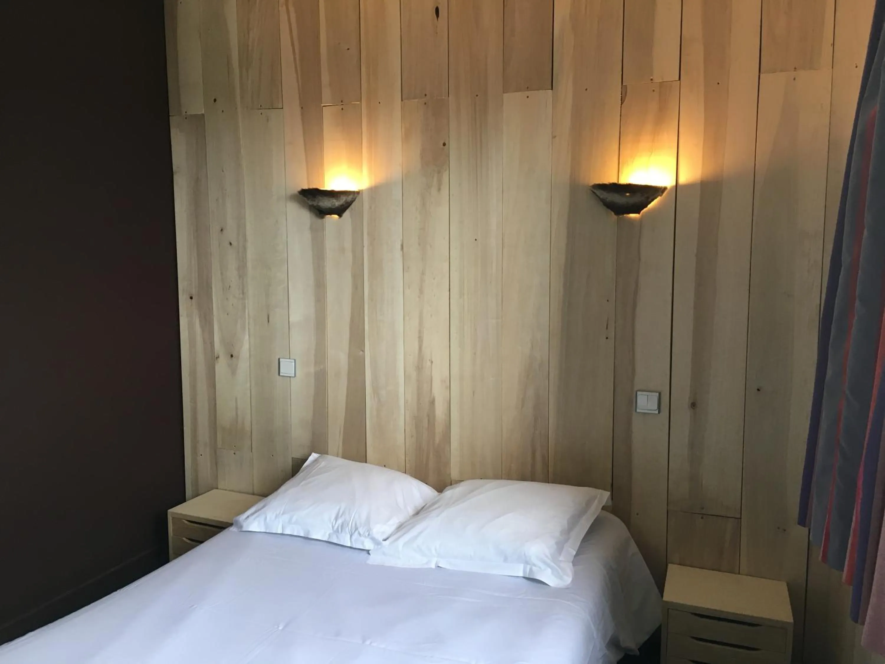 Bed in Fasthotel L'Eldorado