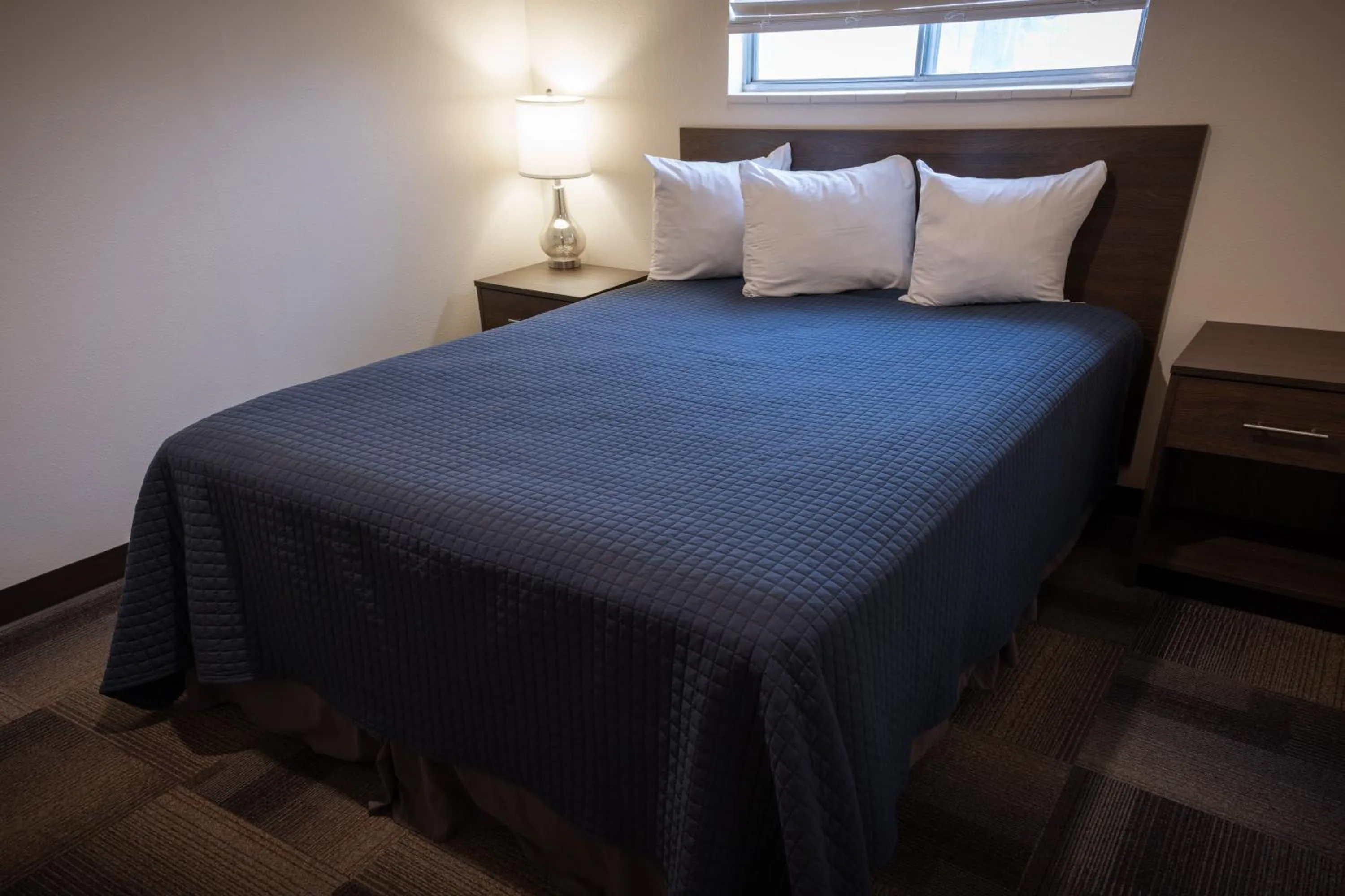 Bed in Clover Creek Inn