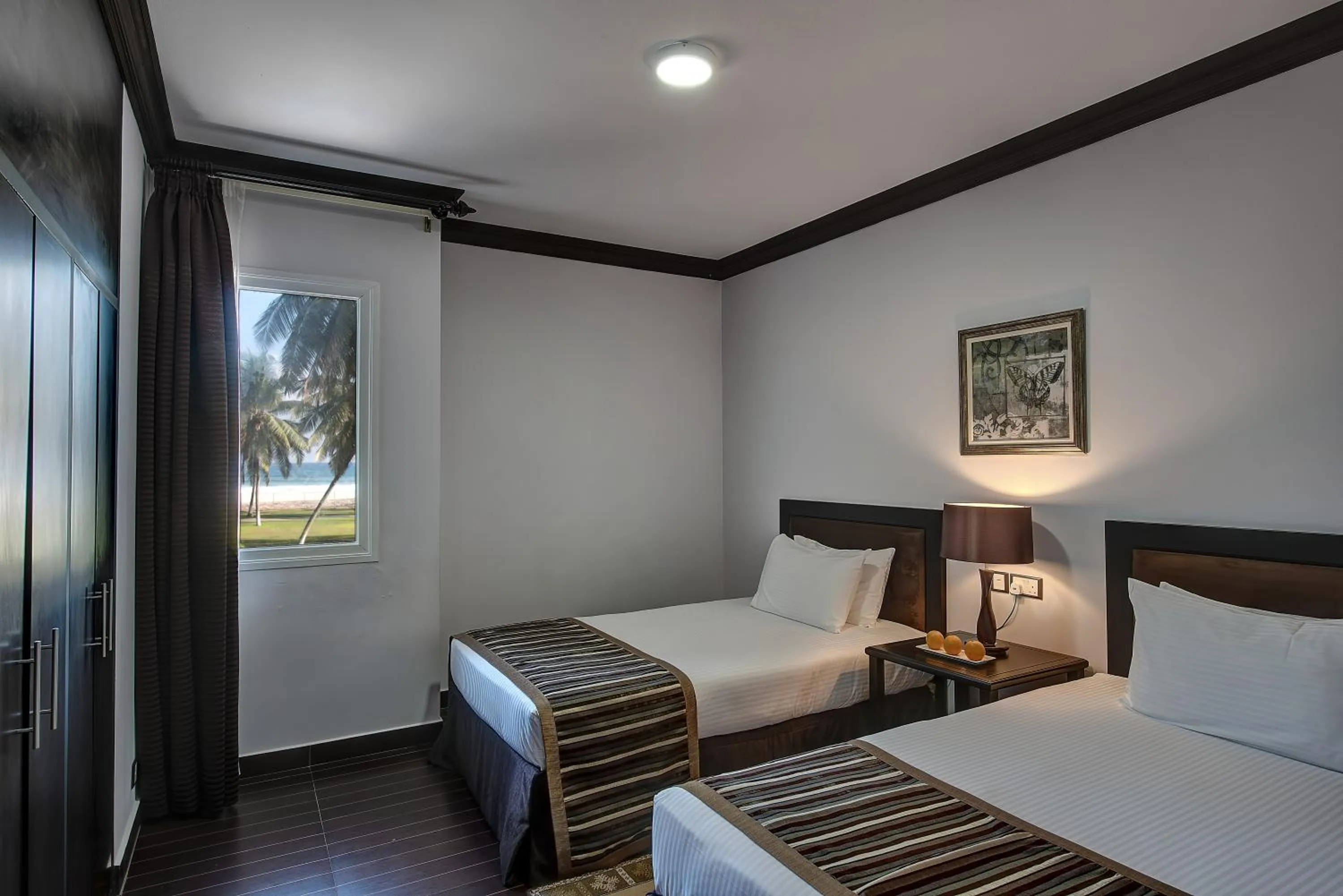 Bedroom, Bed in Crowne Plaza Resort Salalah by IHG