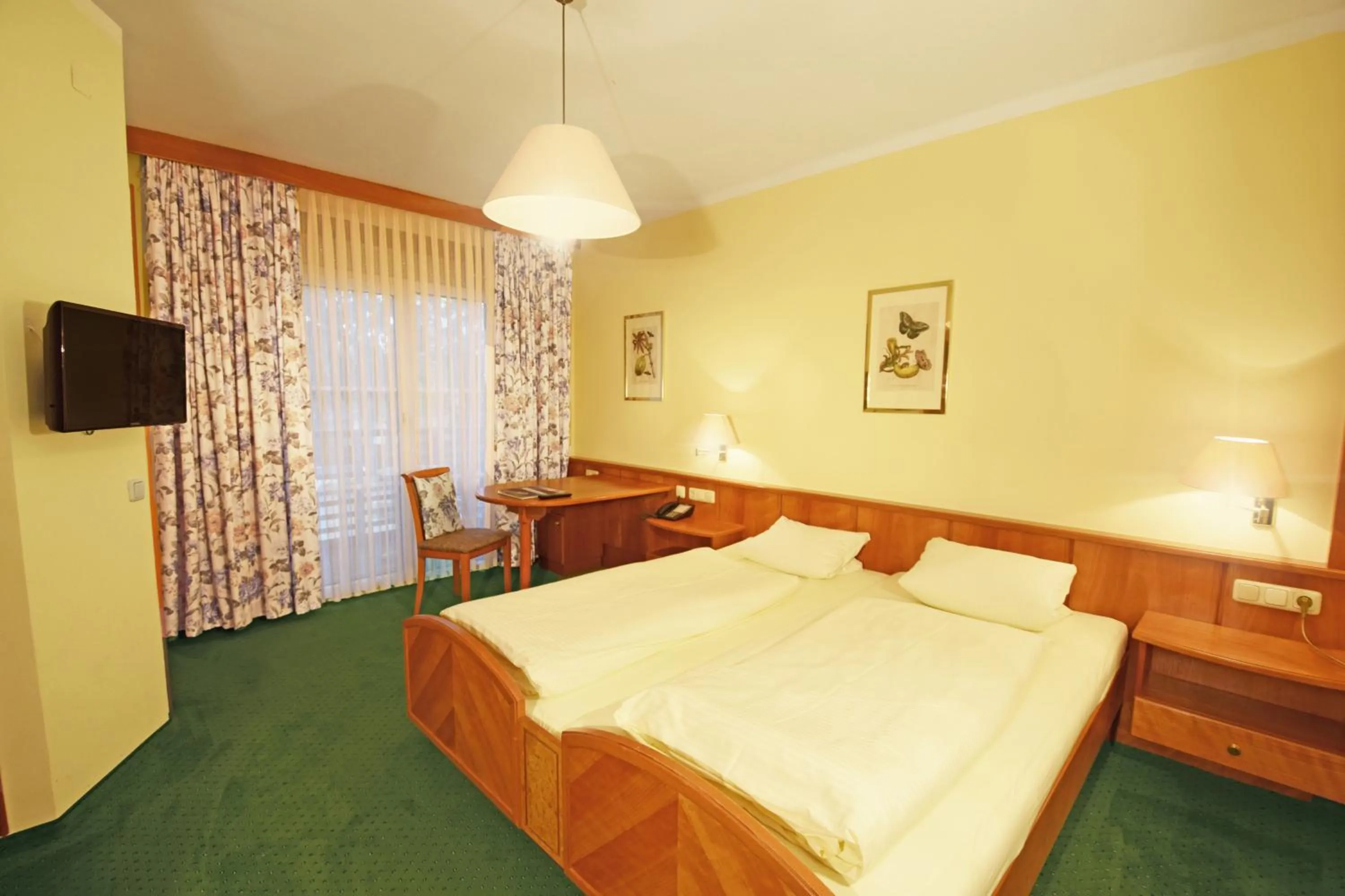 Photo of the whole room, Bed in Hotel Birkenhof am See