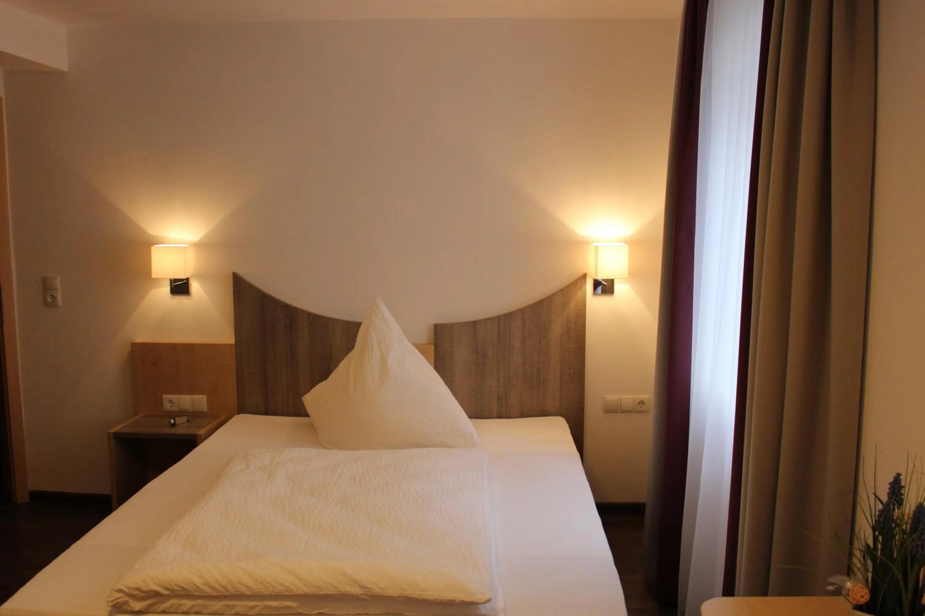 Bed in Hotel-Gasthaus-Kraft