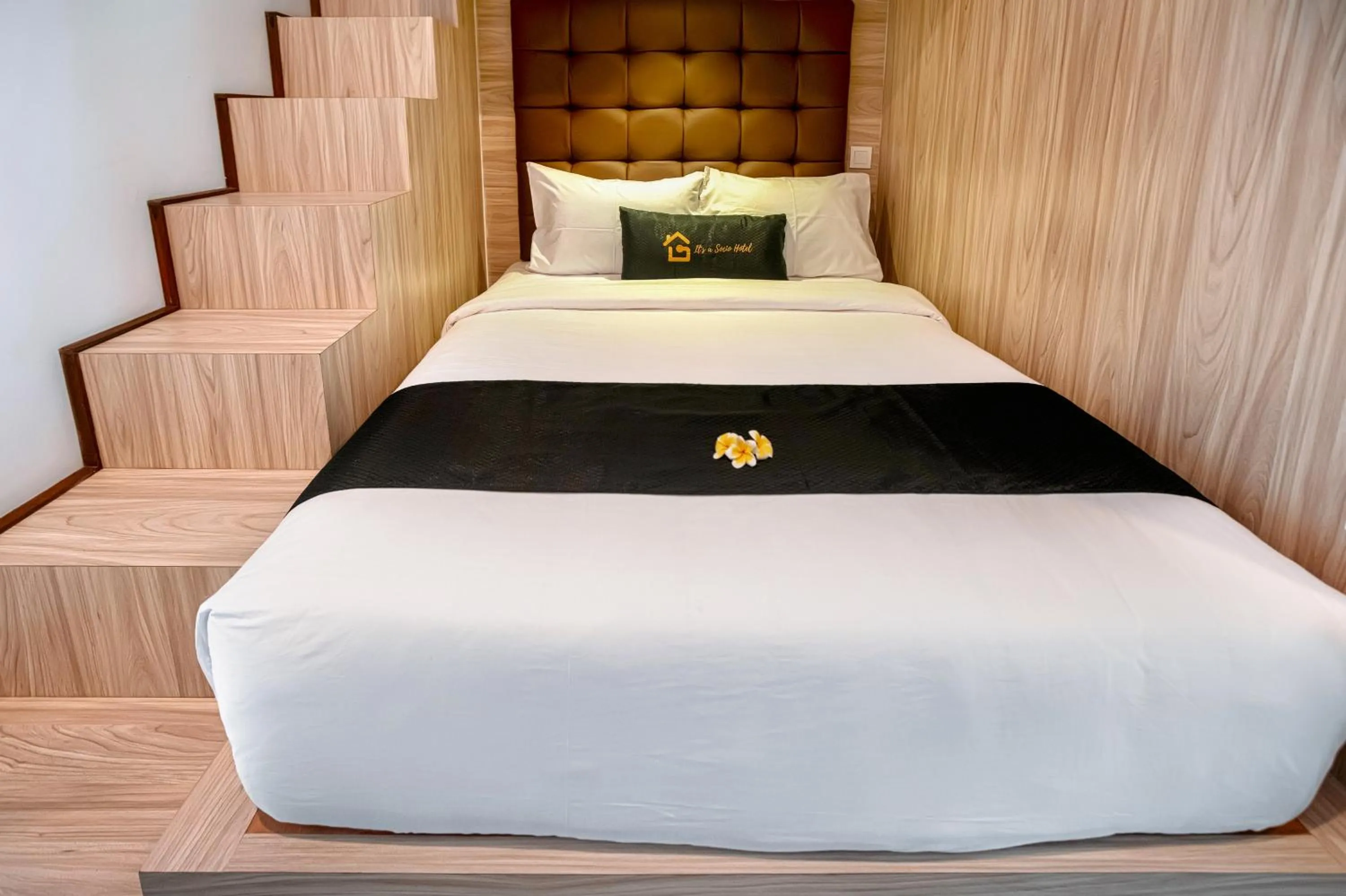 Bed in Graha Socio Hotel Nusa Dua Bali