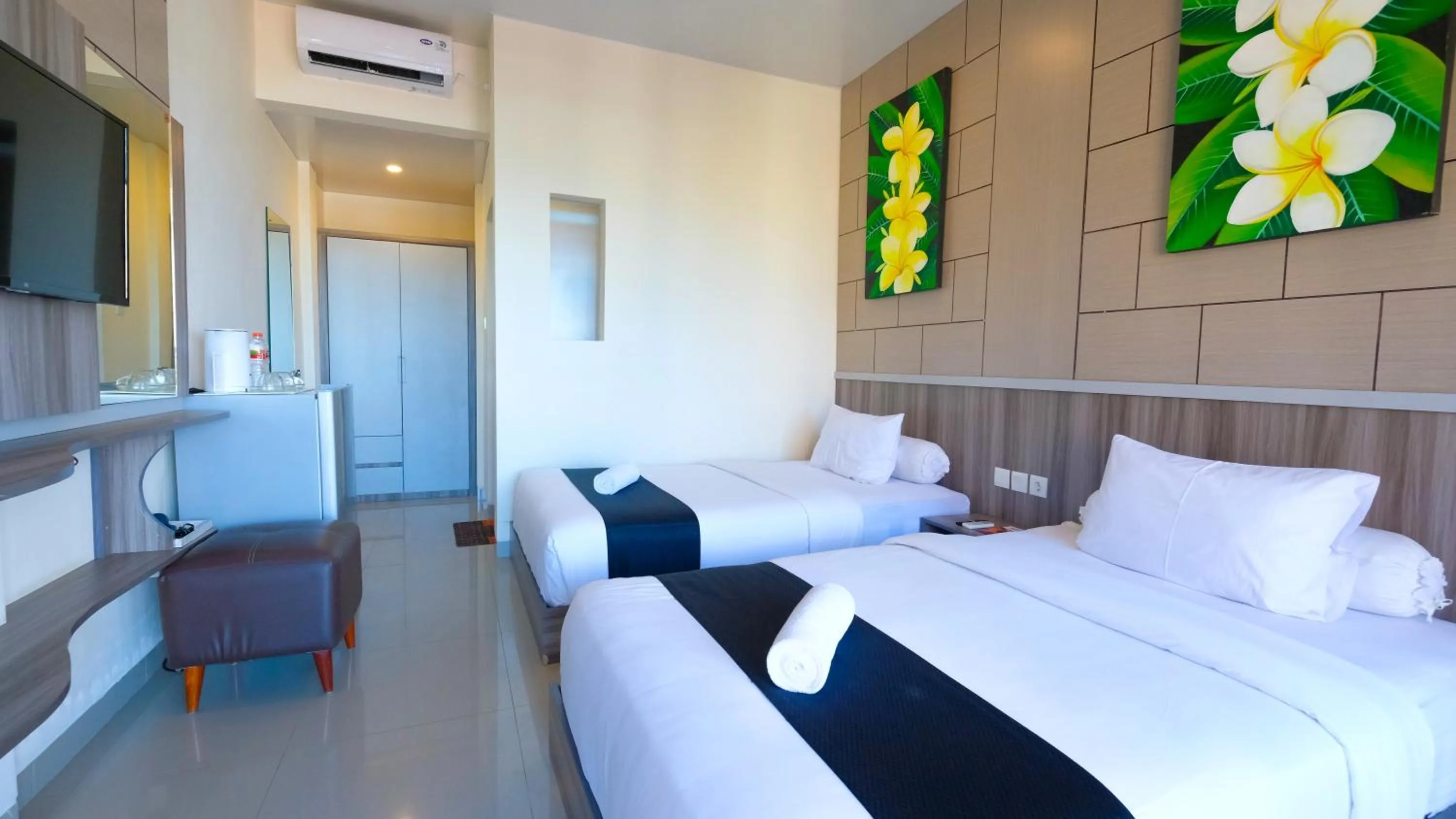 Bed in Graha Socio Hotel Nusa Dua Bali