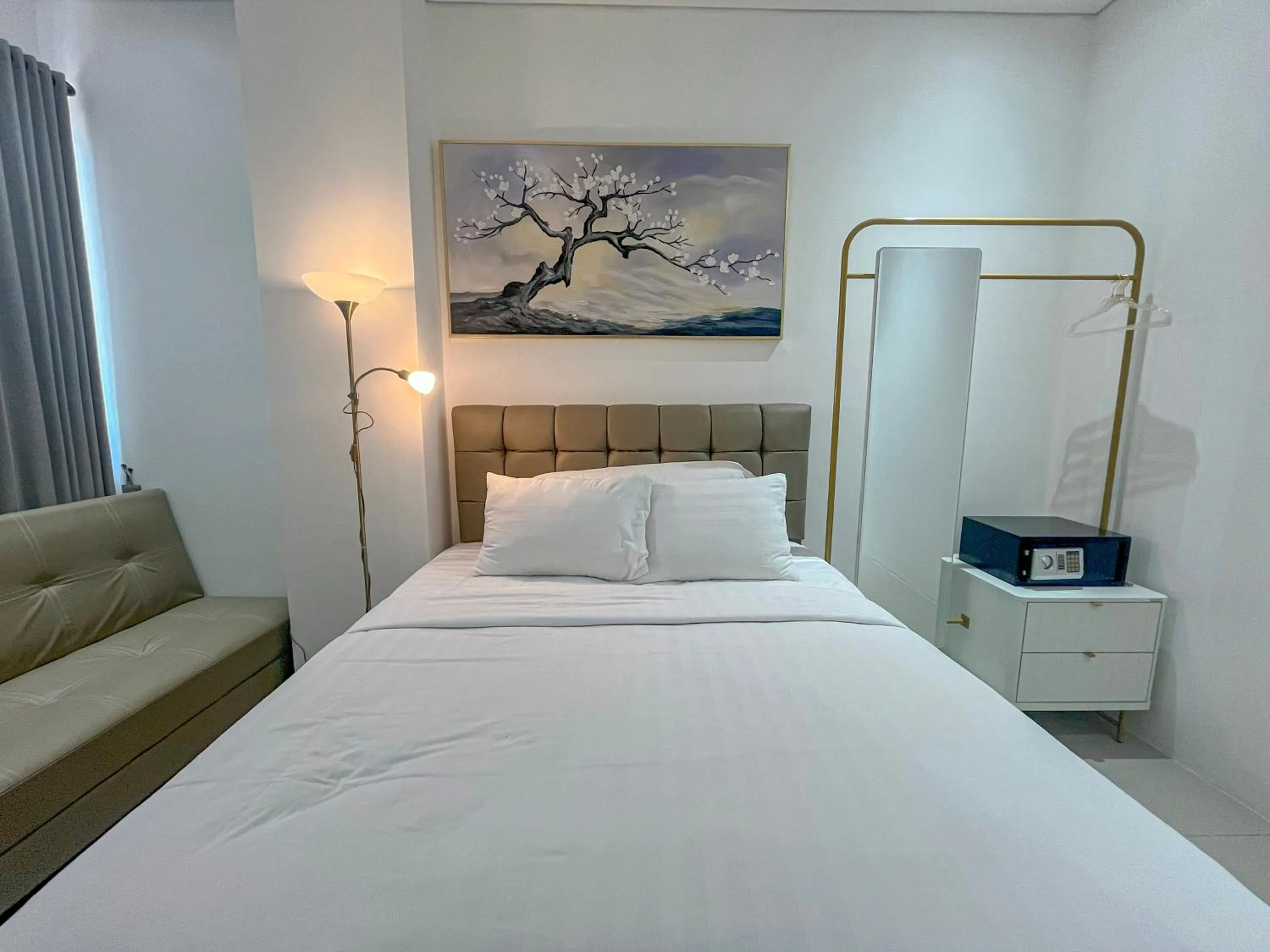 Bathroom, Bed in Graha Socio Hotel Nusa Dua Bali