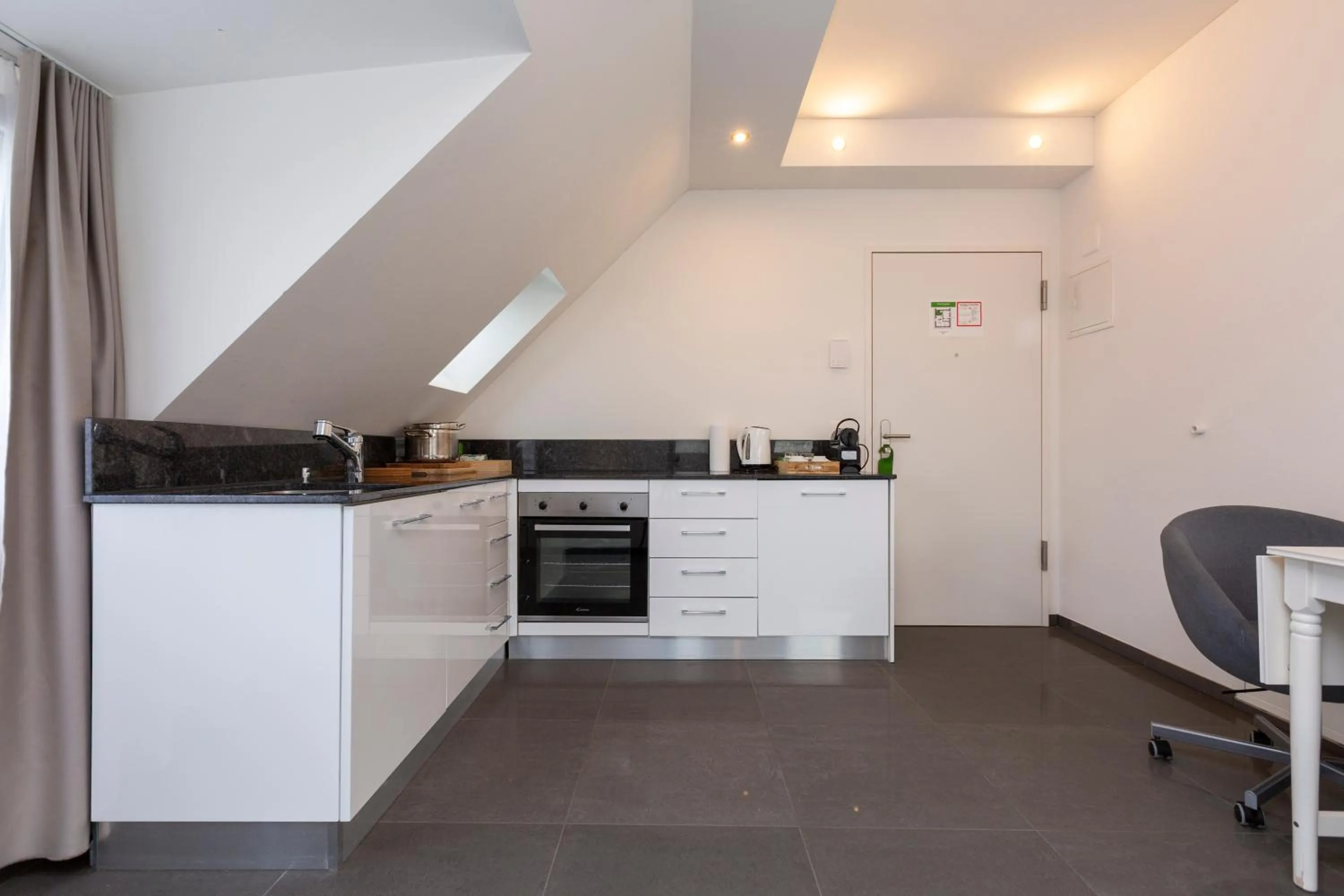 Kitchen or kitchenette in Hotel Kernhof Self Check-In