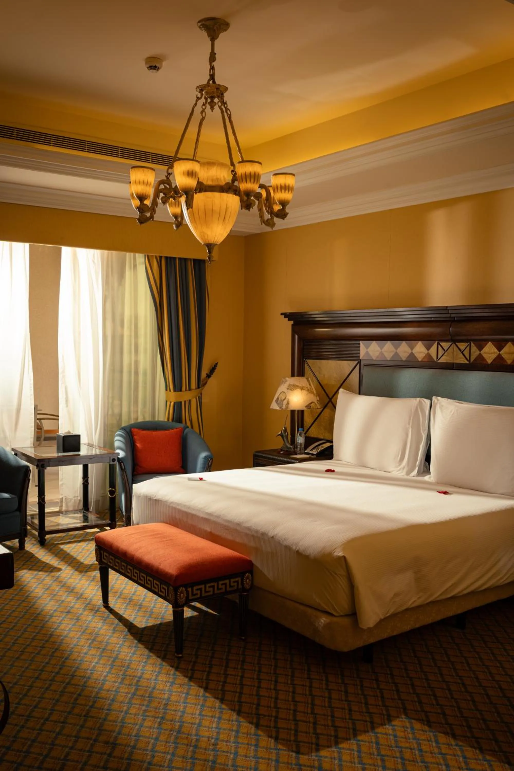 Living room, Bed in Al Raha Beach Resort & Spa