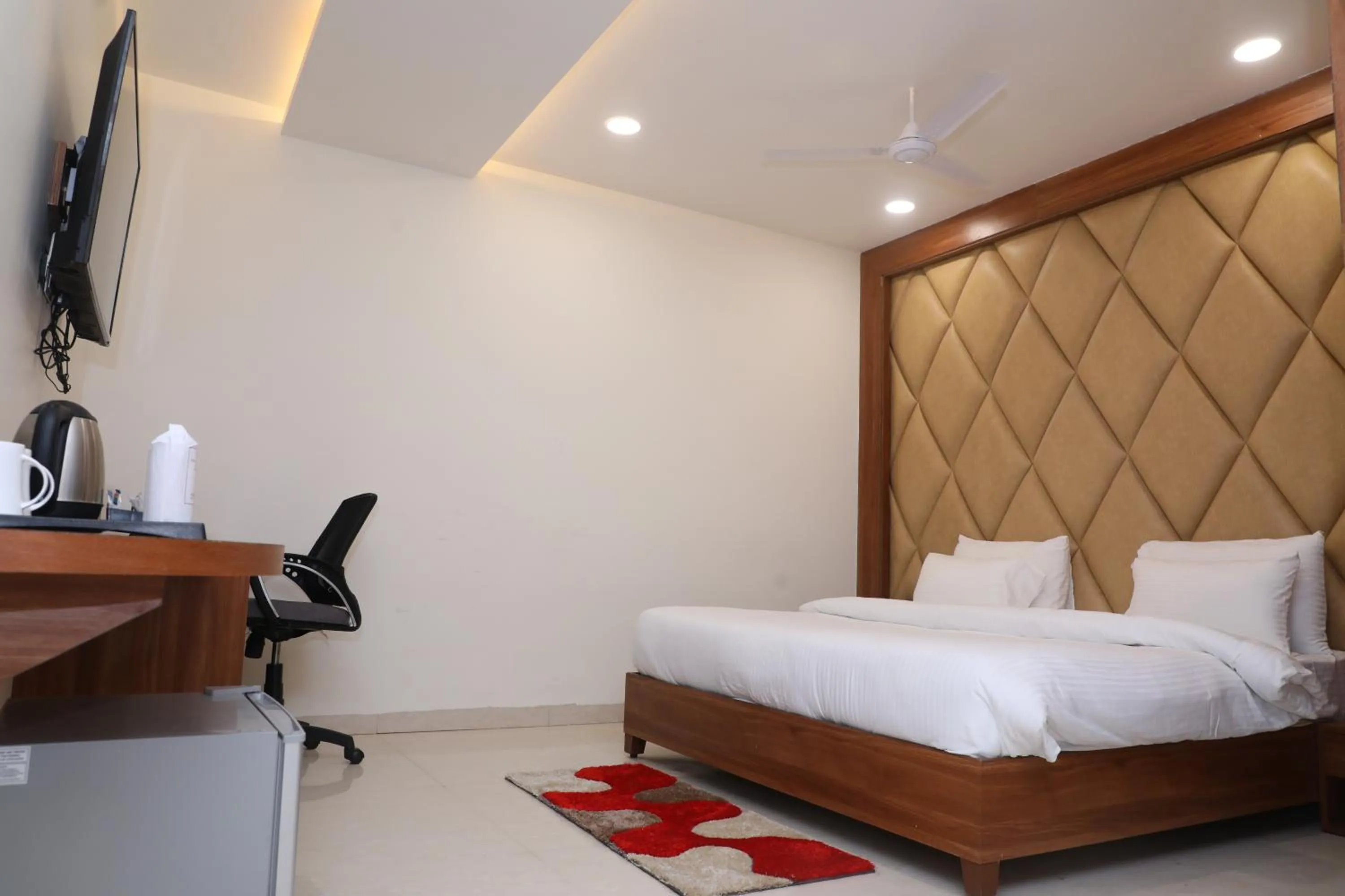 Bed in Hotel Pradeep Star Inn