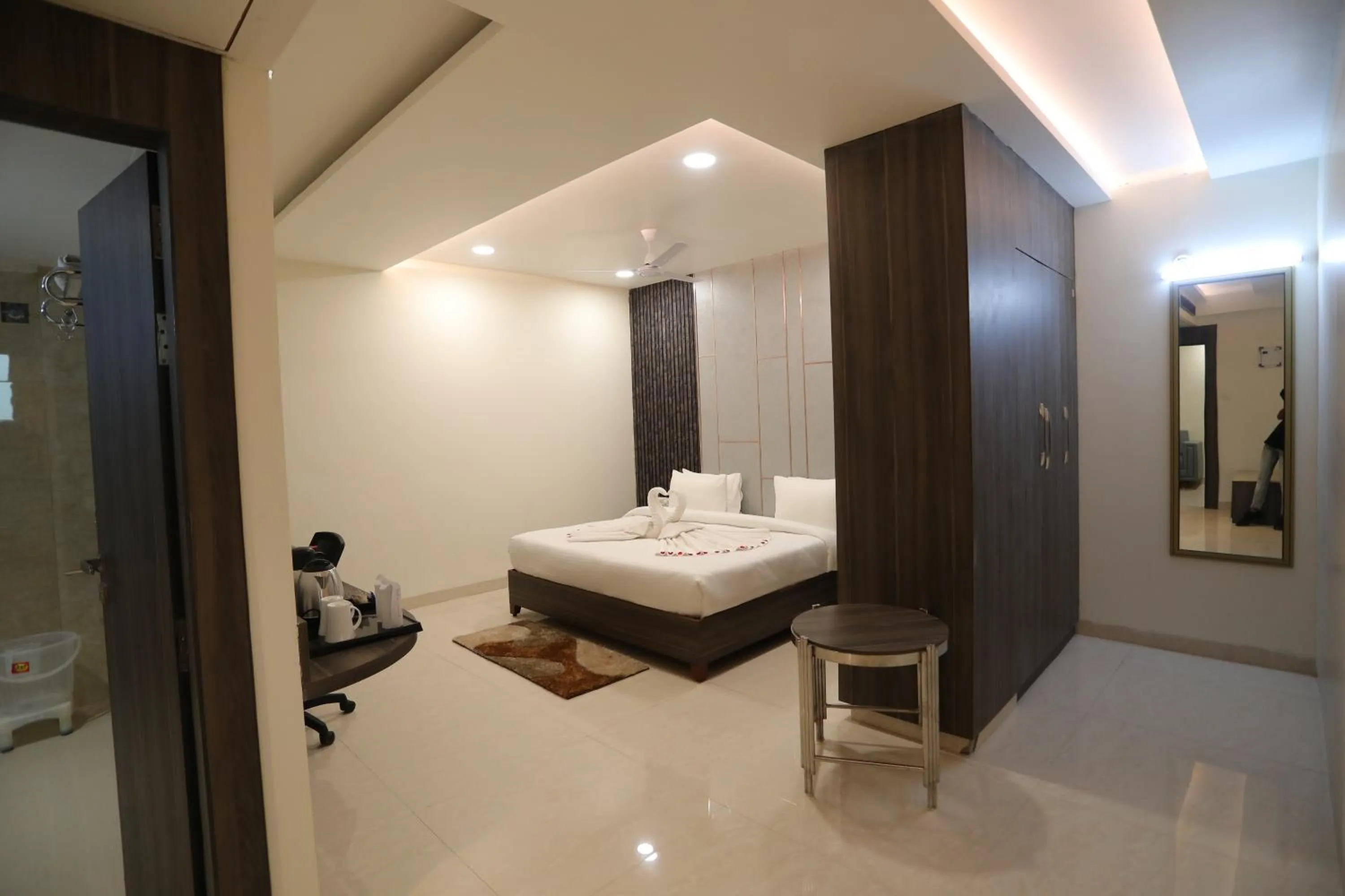 Photo of the whole room, Bed in Hotel Pradeep Star Inn