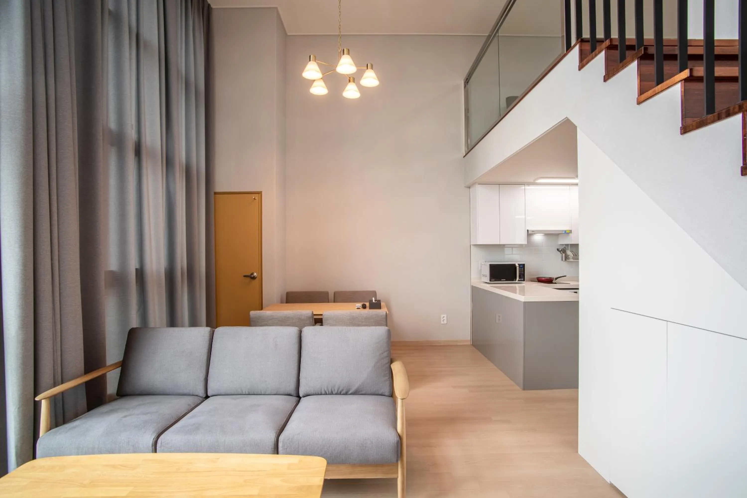 Kitchen or kitchenette in Jeju Central Park Residence