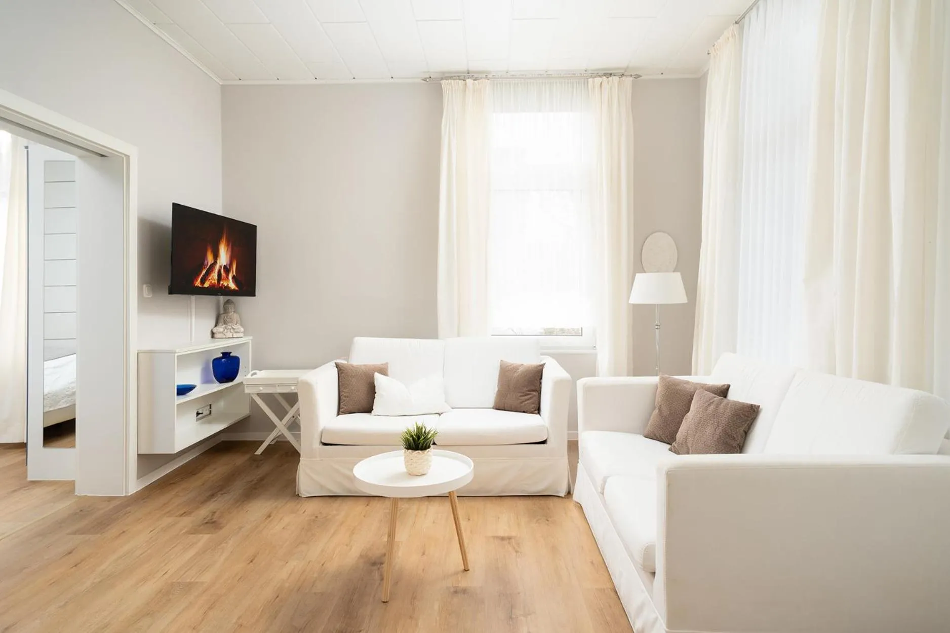 Communal lounge/ TV room in Hotel Haus am Park