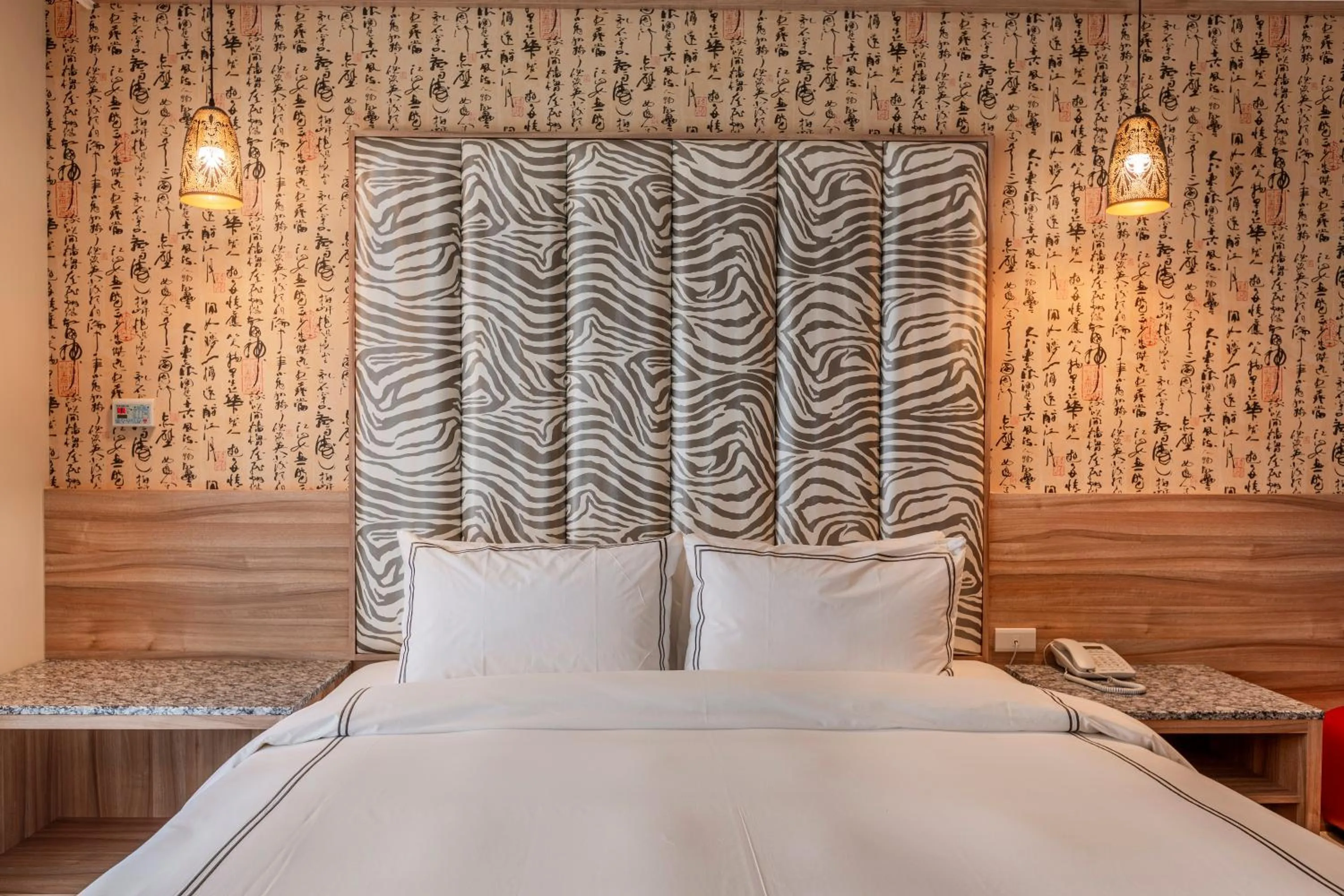 Bed in San Chiao Hotel