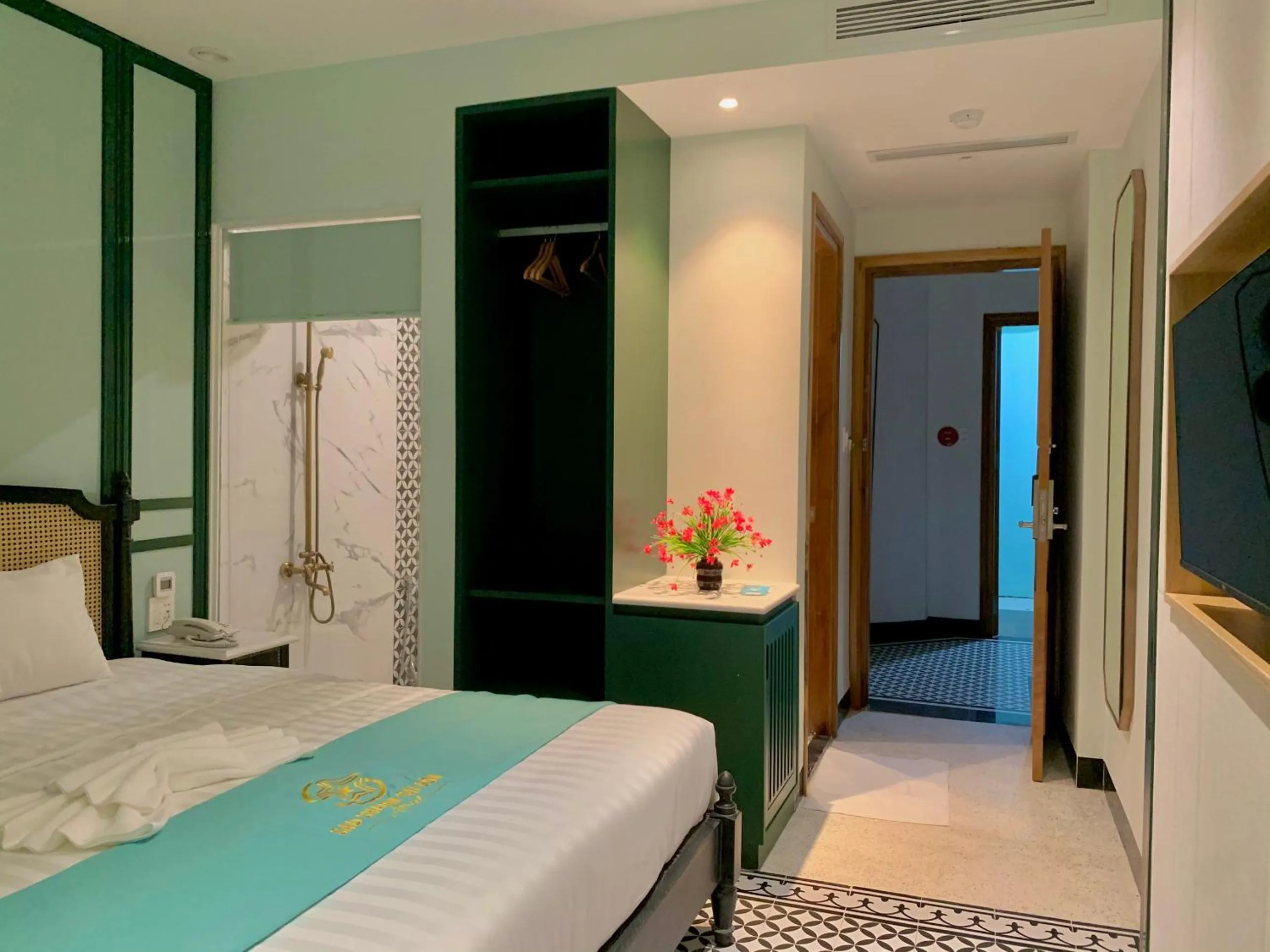 Bed in Sao Charm Sài Gòn Hotel