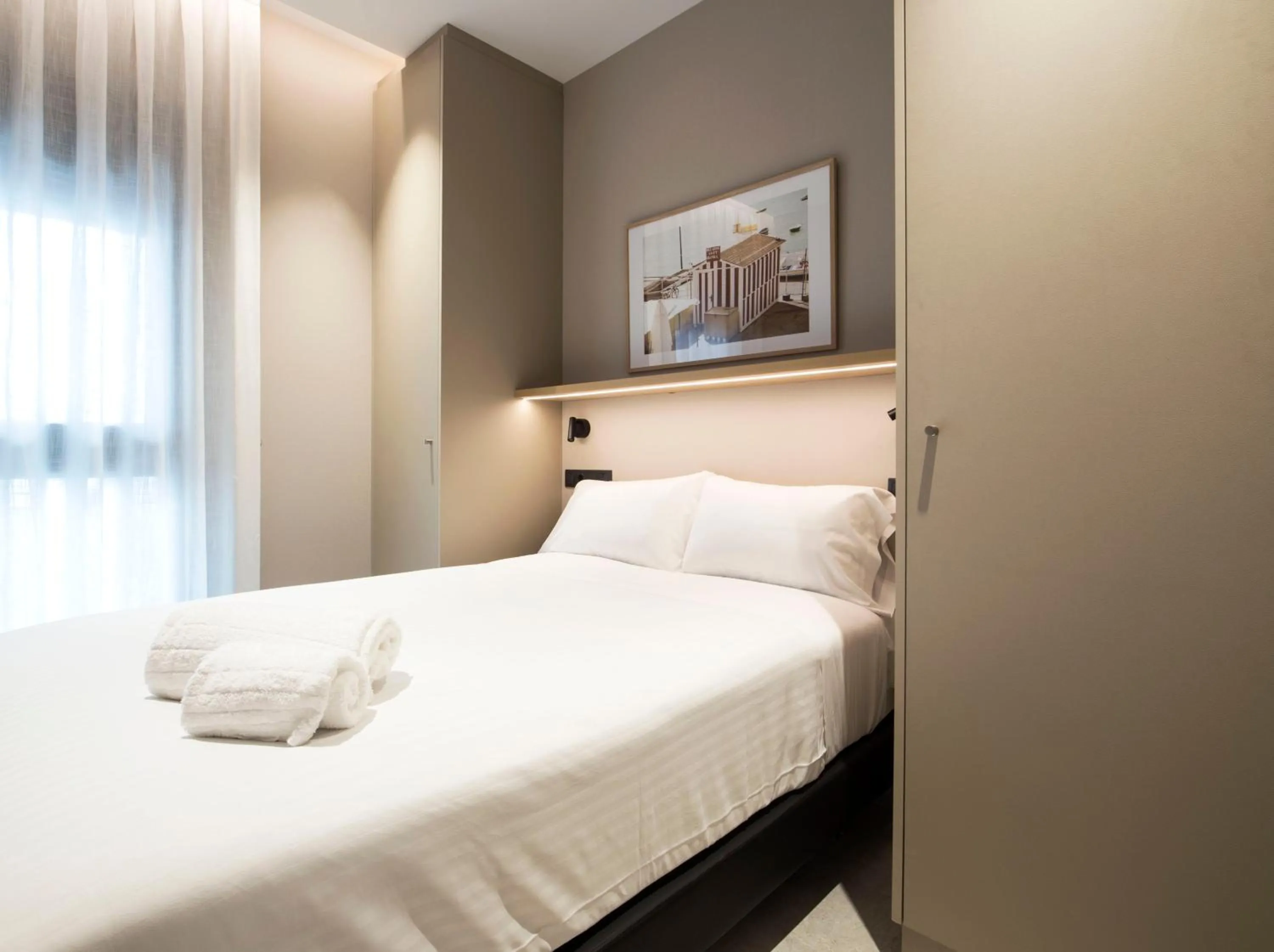 Bed in Goodnight Cádiz Apartments