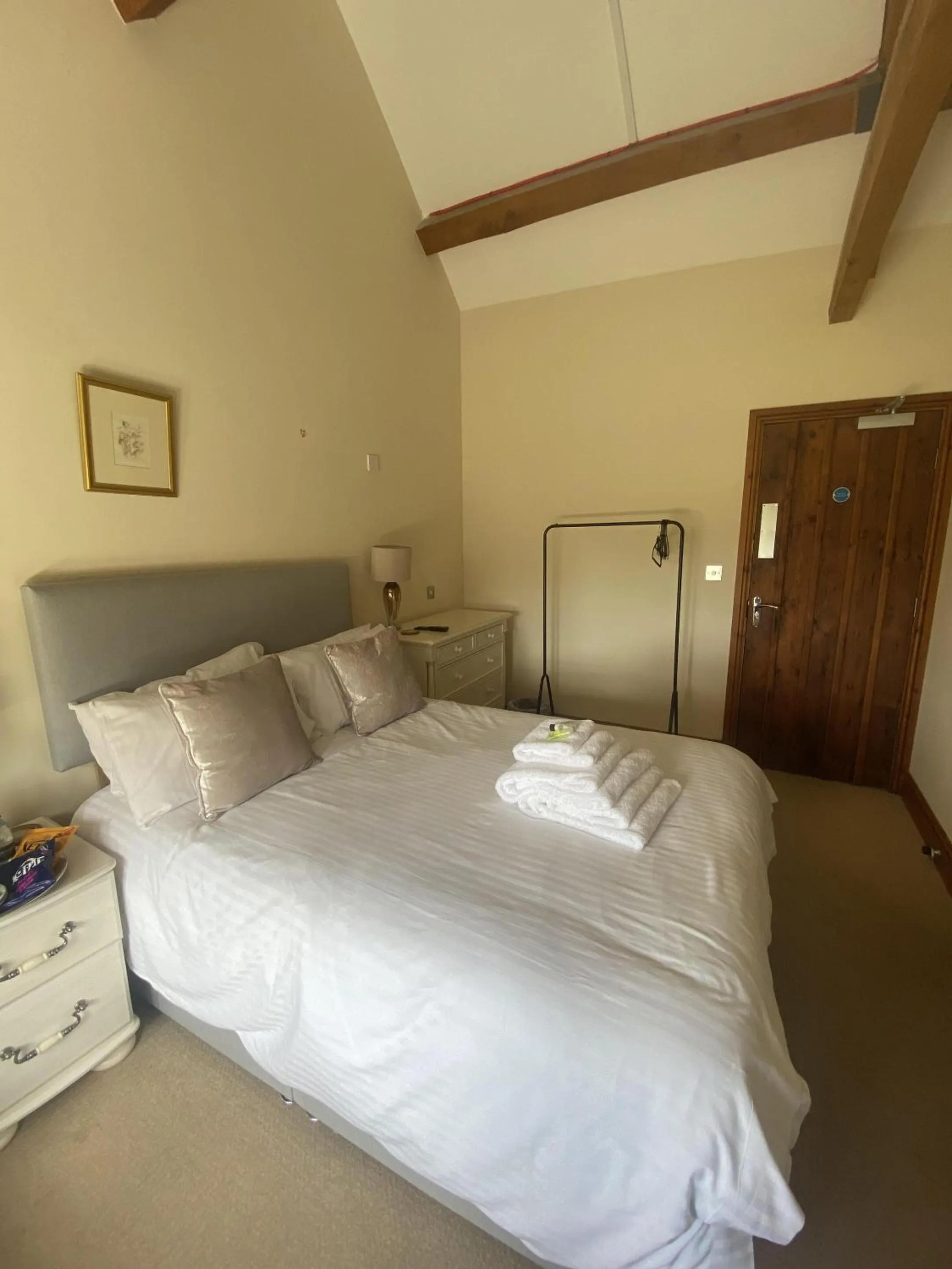 Bedroom in The Rising Sun Inn