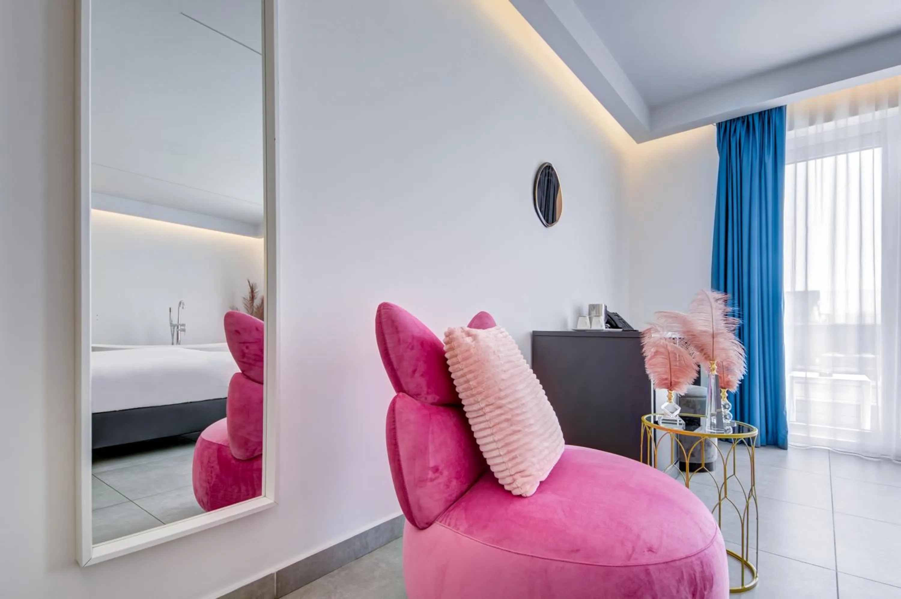 Seating area, Bed in Flamingo Hotel Malta