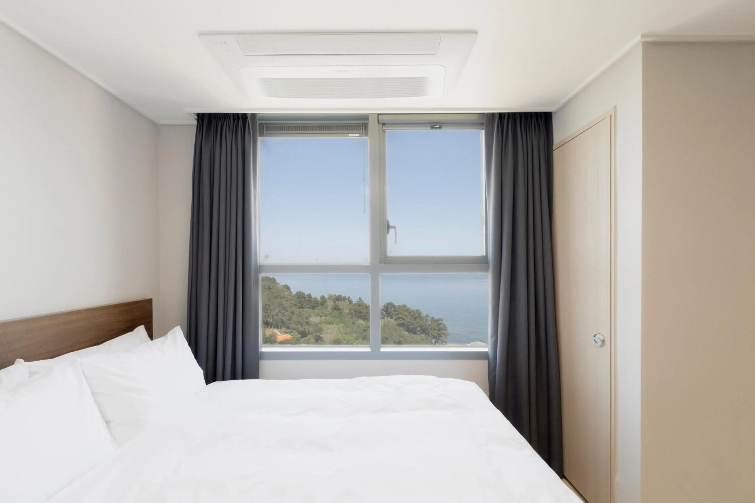 Bed in Donghae Oceancity Residence Hotel