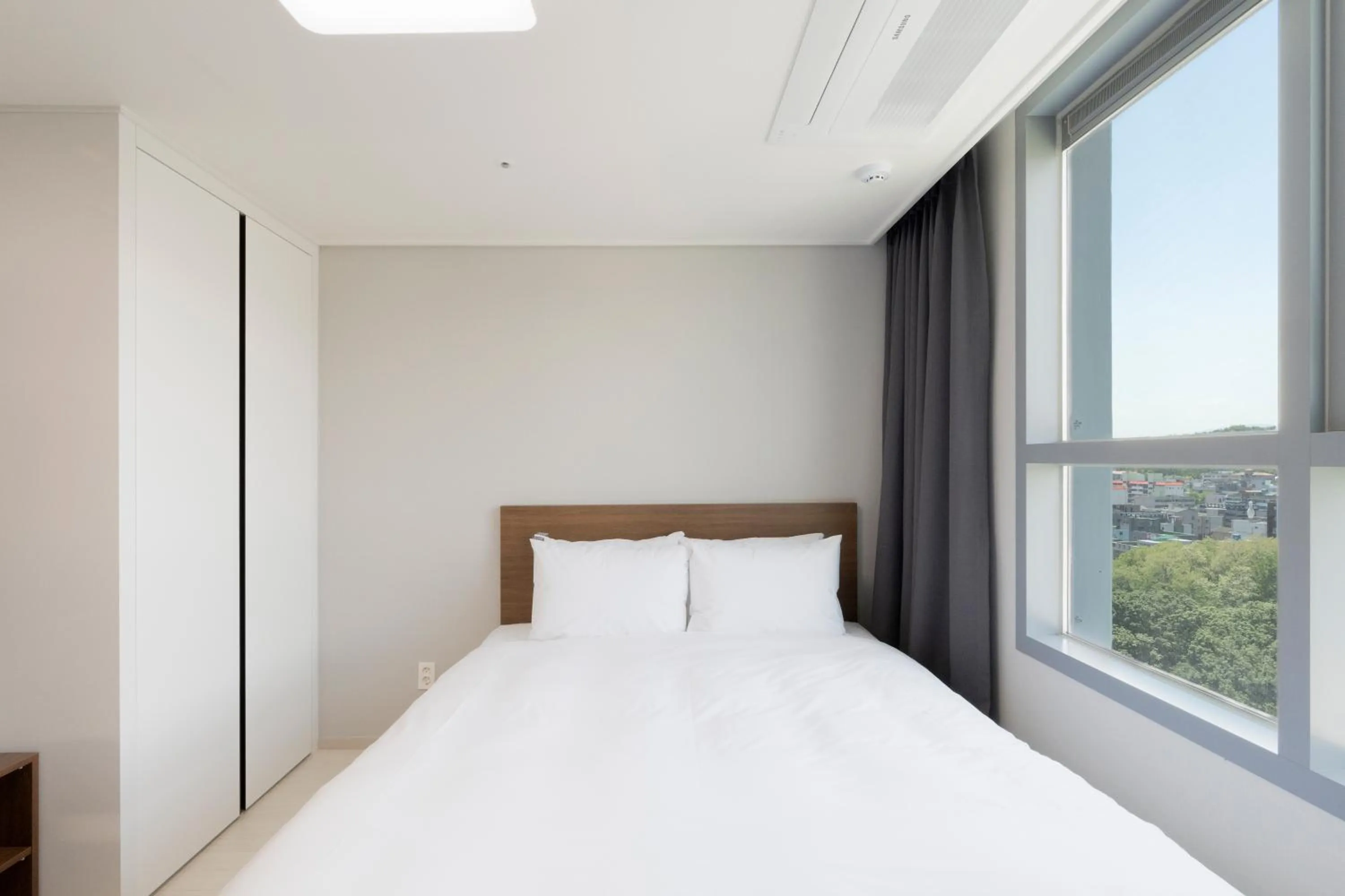 Bed in Donghae Oceancity Residence Hotel