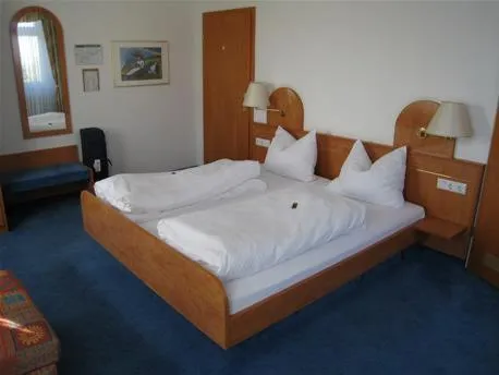 Bed in Hotel Daun