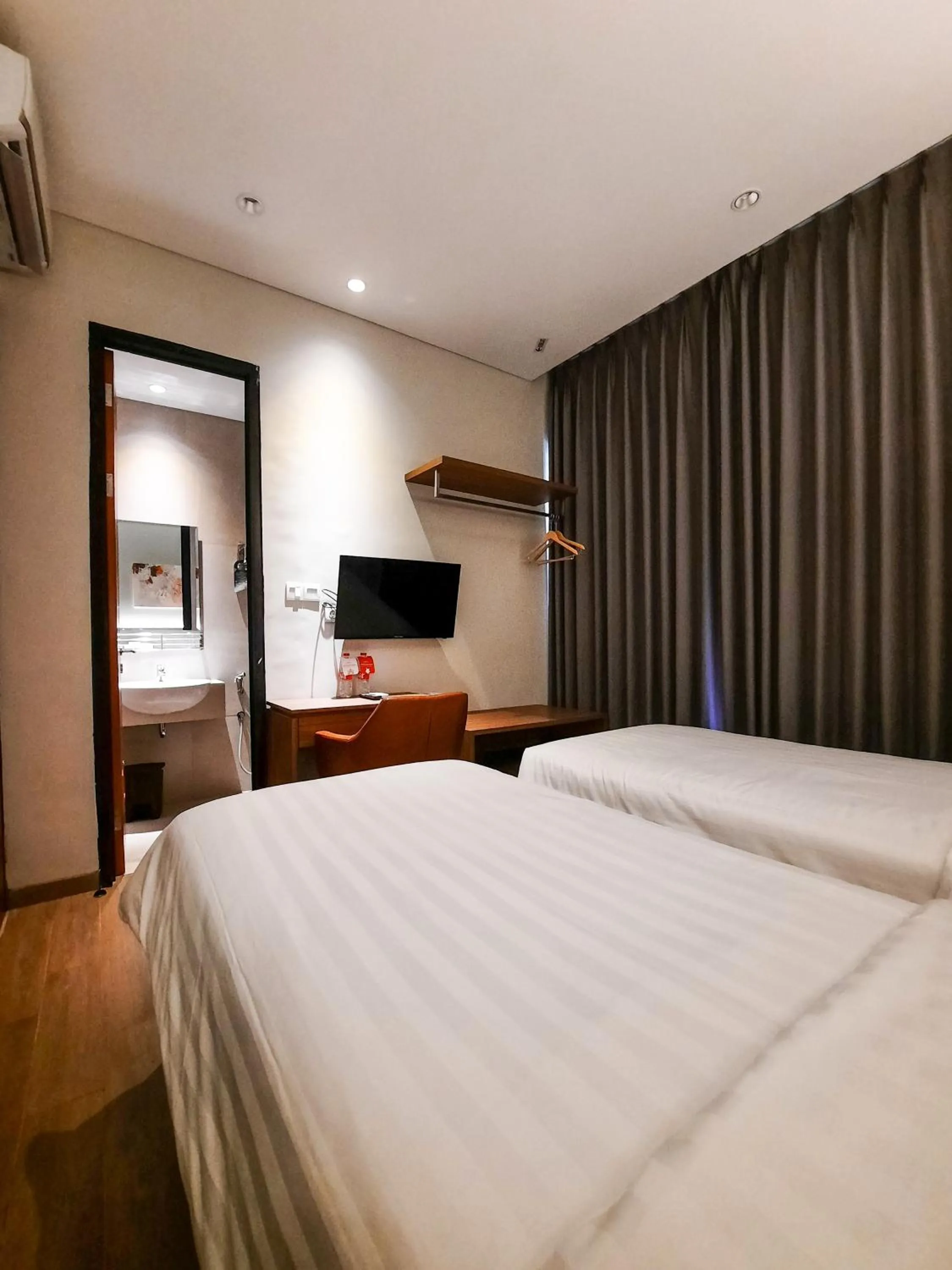 Bed in Votel Krakatau Boutique Hotel Semarang