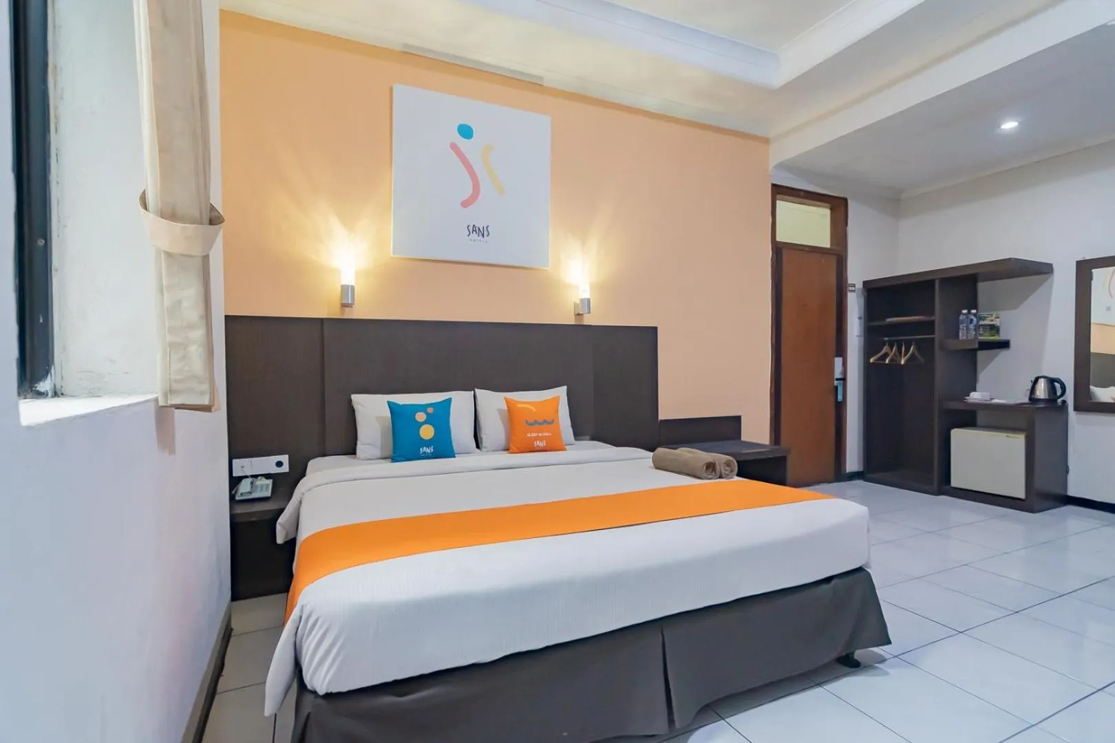 Bedroom in Sans Hotel Cihampelas Bandung