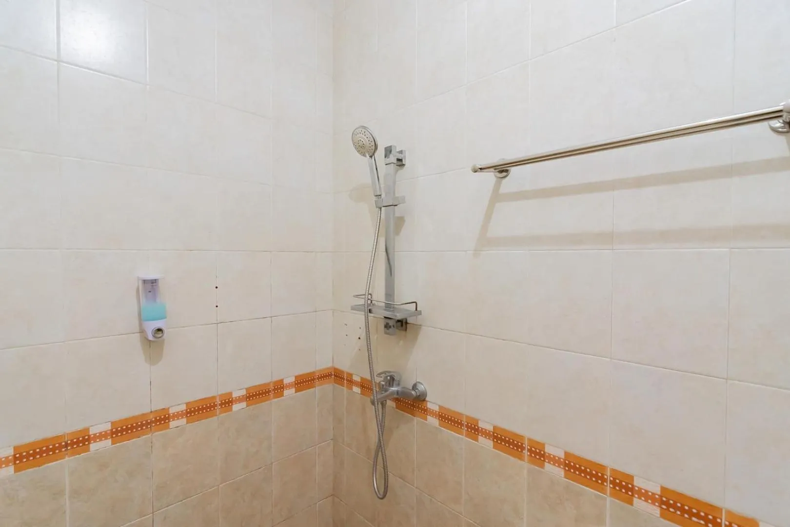 Bathroom in Sans Hotel Cihampelas Bandung