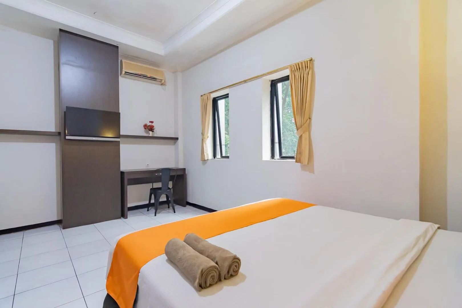 Bedroom in Sans Hotel Cihampelas Bandung