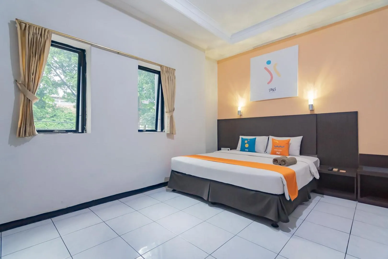 Bedroom in Sans Hotel Cihampelas Bandung